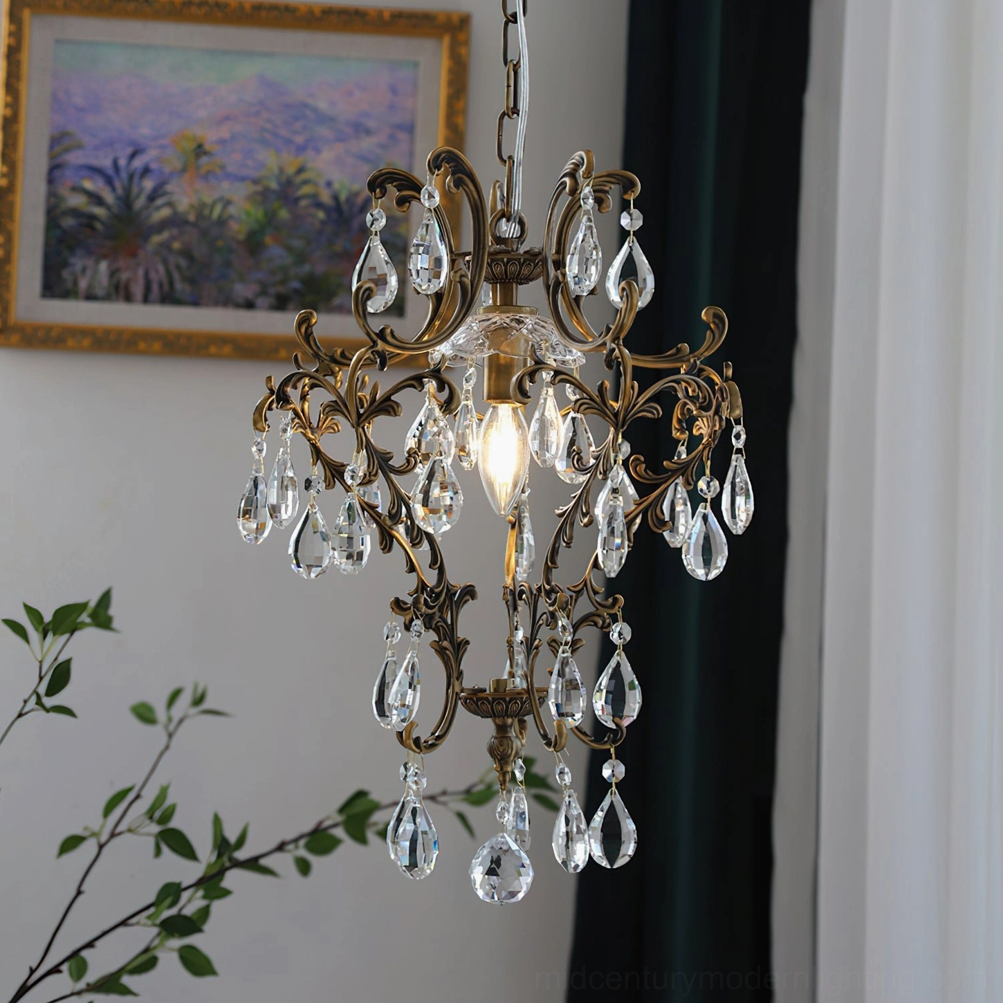 Vintage-style birdcage crystal pendant with ornate metalwork and luminous crystal accents interior design