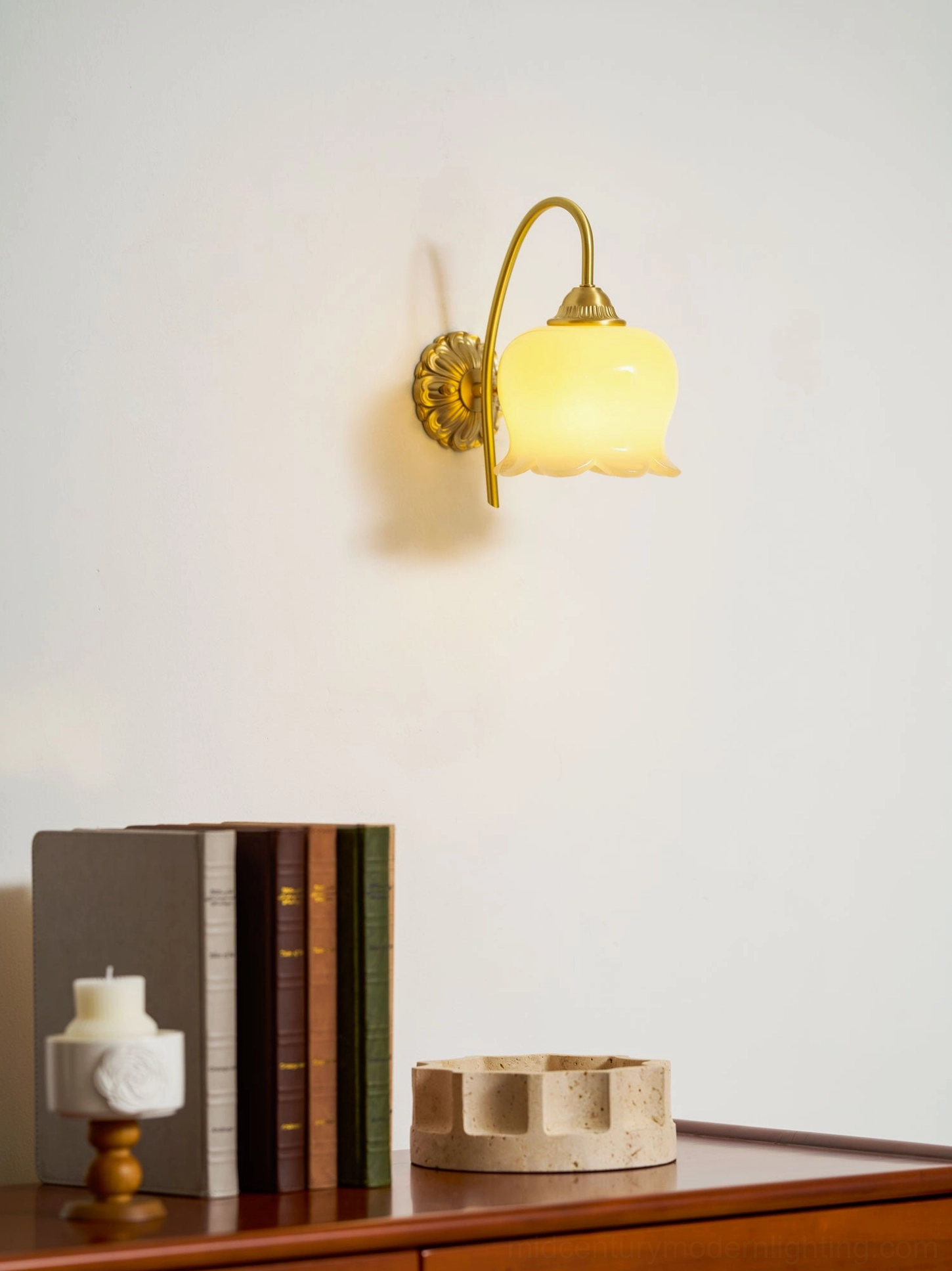 Styled lily of the valley wall lamp in vintage interior with complementary retro accessories