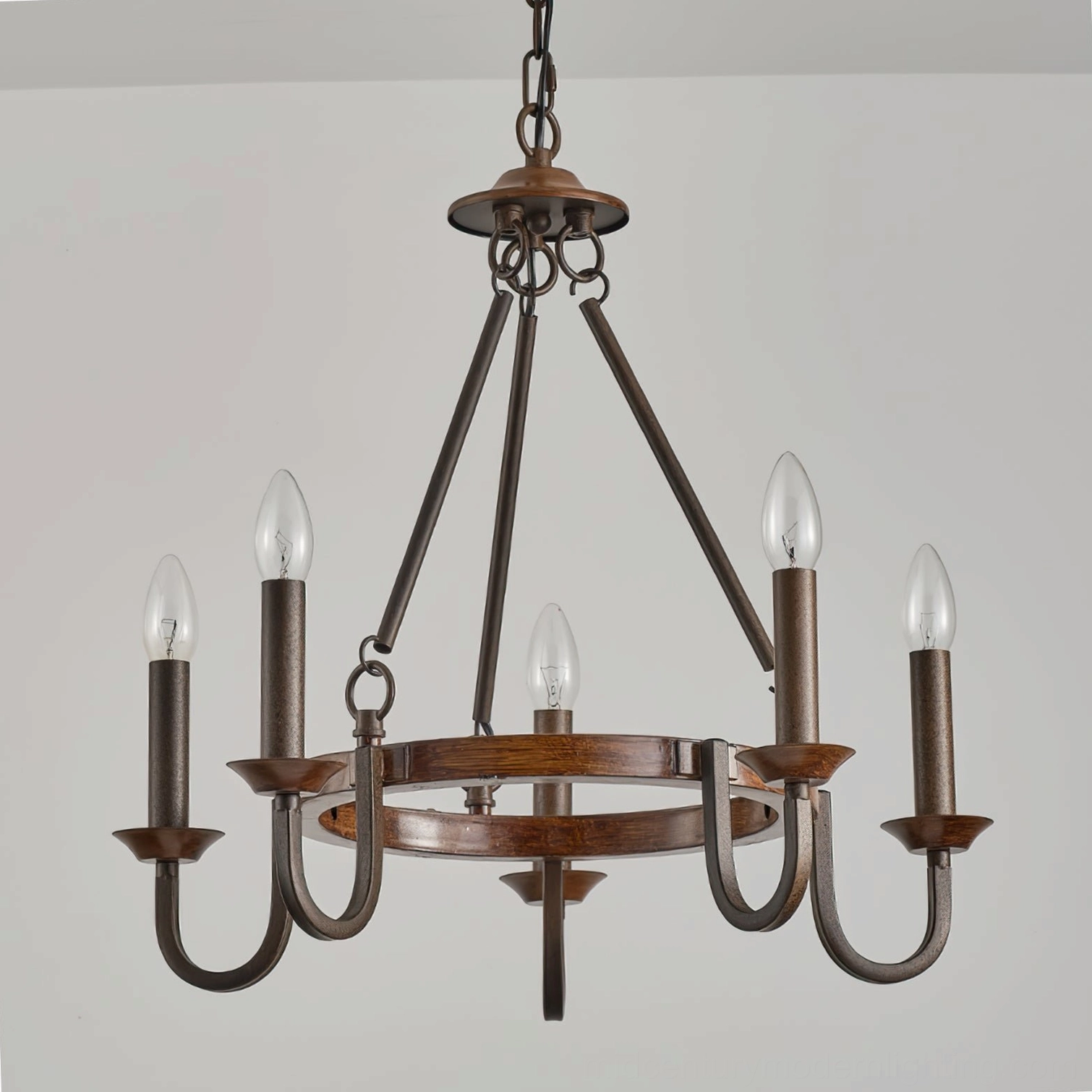 Vintage wagon wheel chandelier three-quarter view dark bronze metal farmhouse design