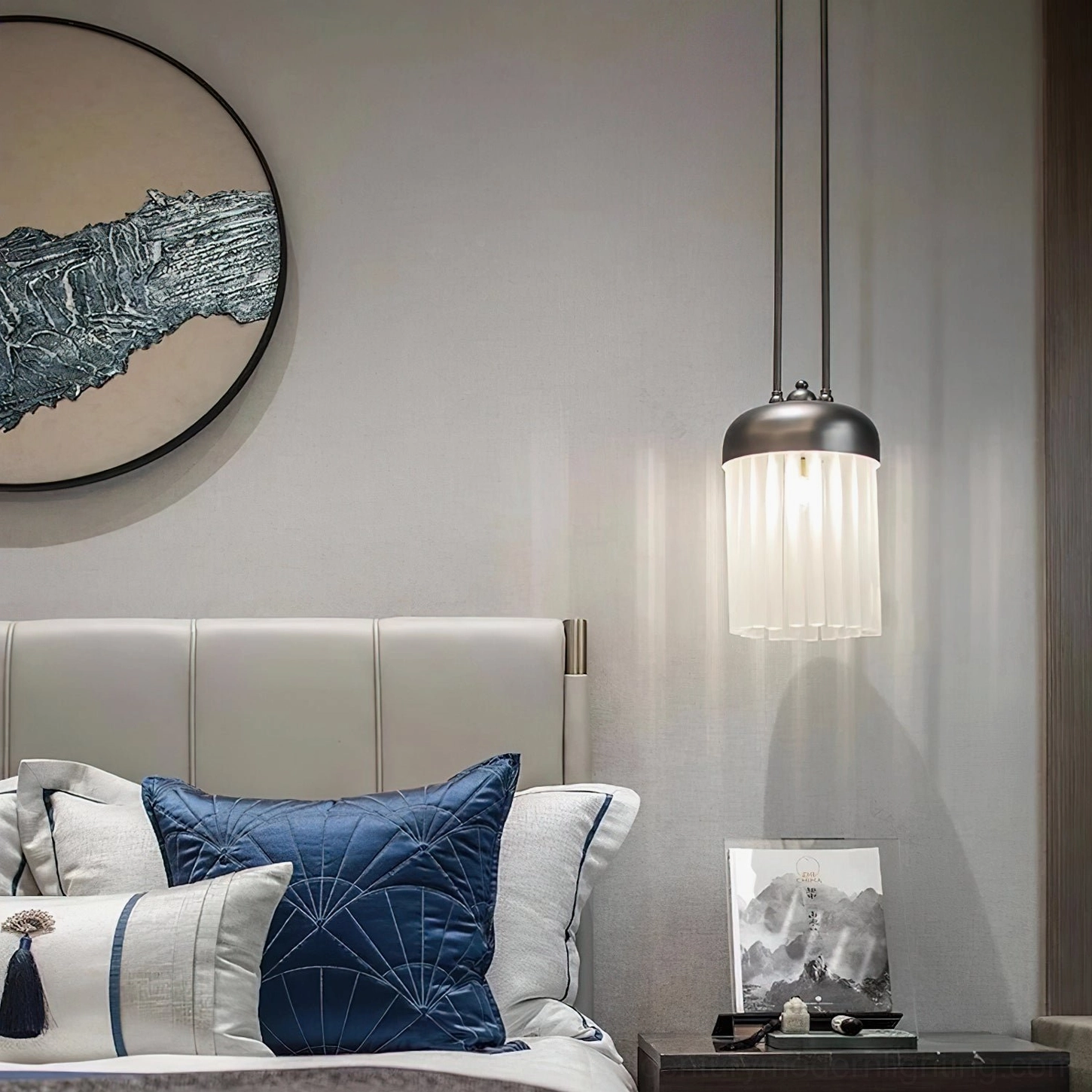 Wall-mounted pendant light in bedroom, eye-level perspective showing compact ribbed glass shade with silver-toned hardware