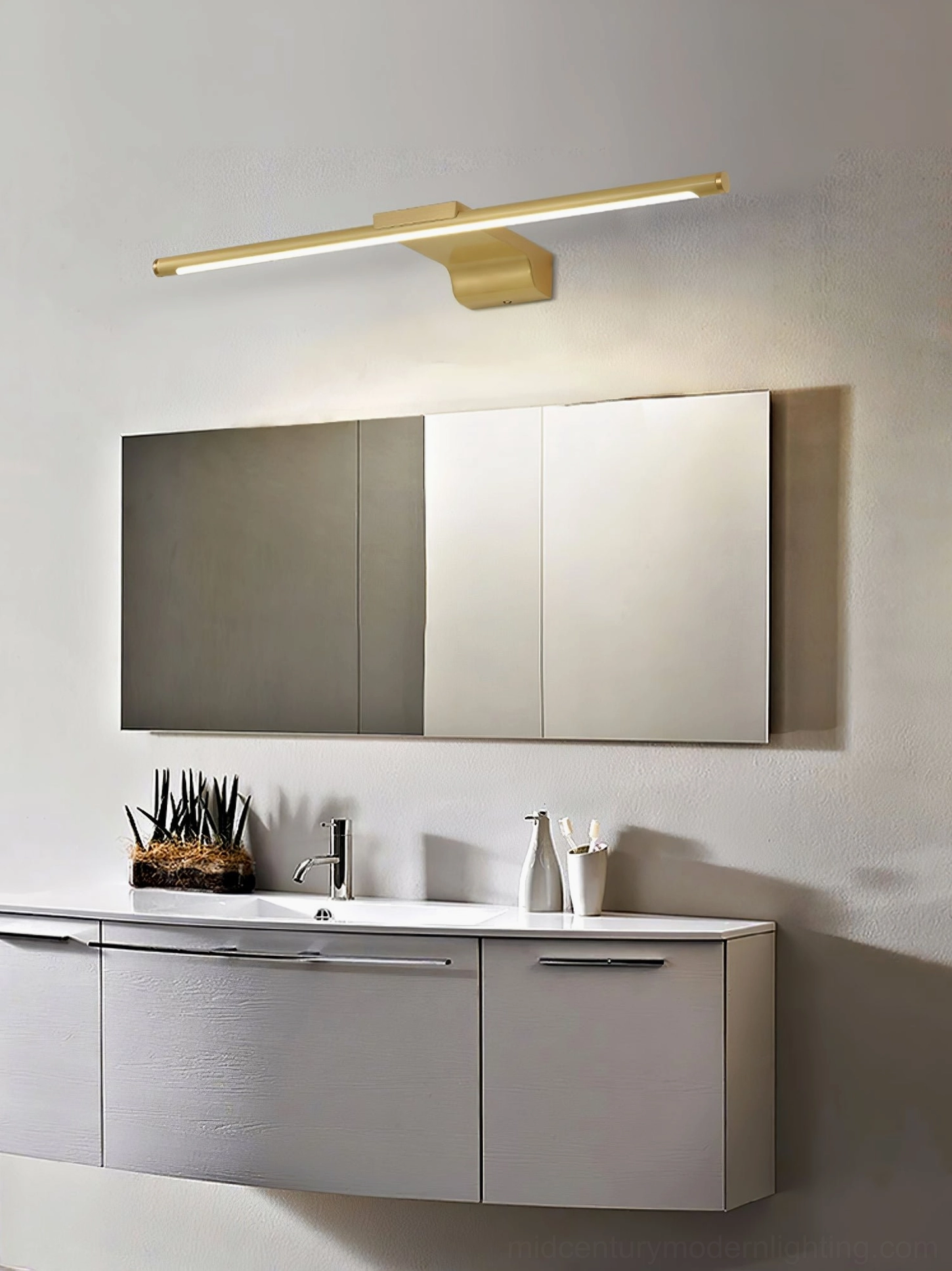 Wall mounted brass lamp with integrated LED technology and warm tone finish