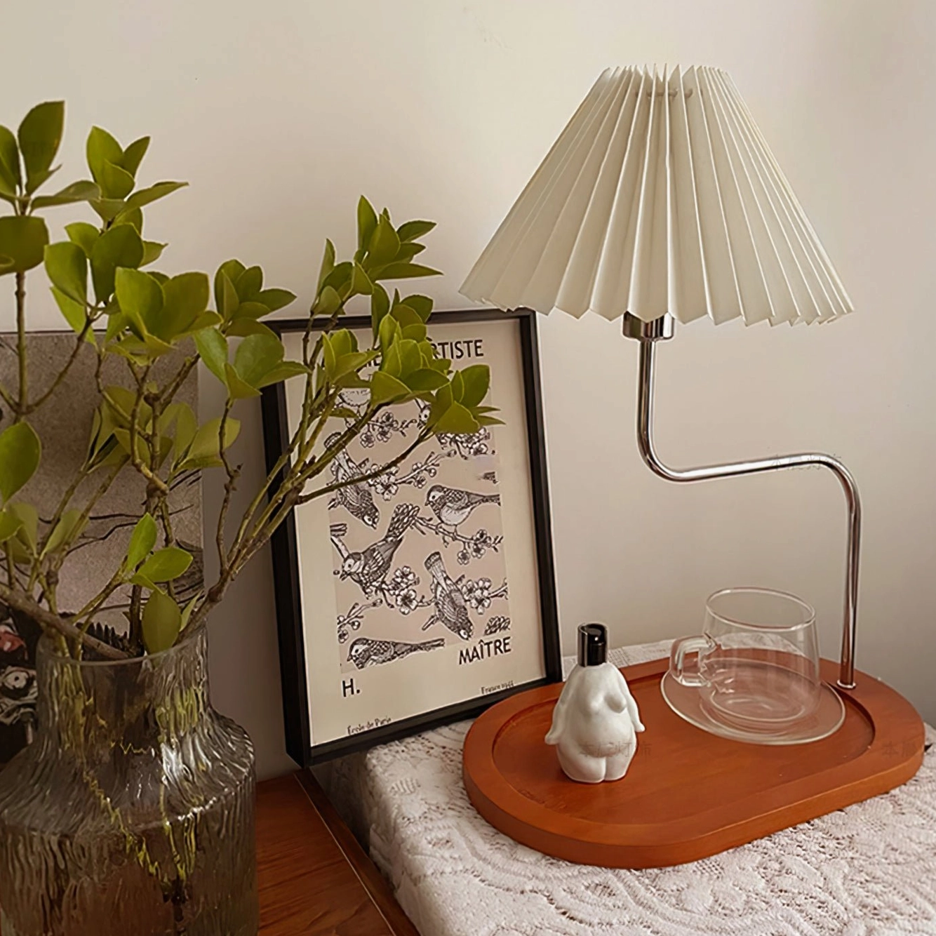 Walnut and chrome table lamp bringing warm mid-century aesthetic to bedroom décor