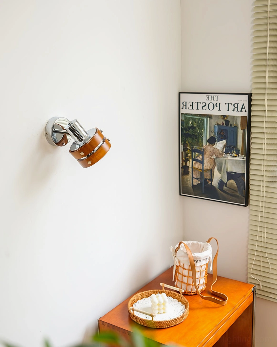 Walnut and chrome wall sconce showing honest minimalist mid-century design