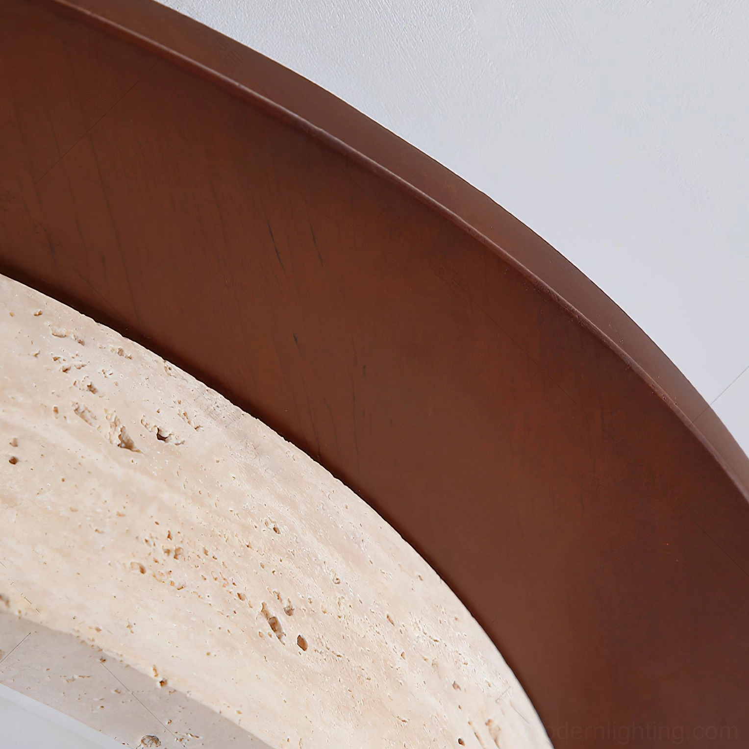 Macro detail shot of smooth walnut wood frame grain of modern flush mount ceiling light
