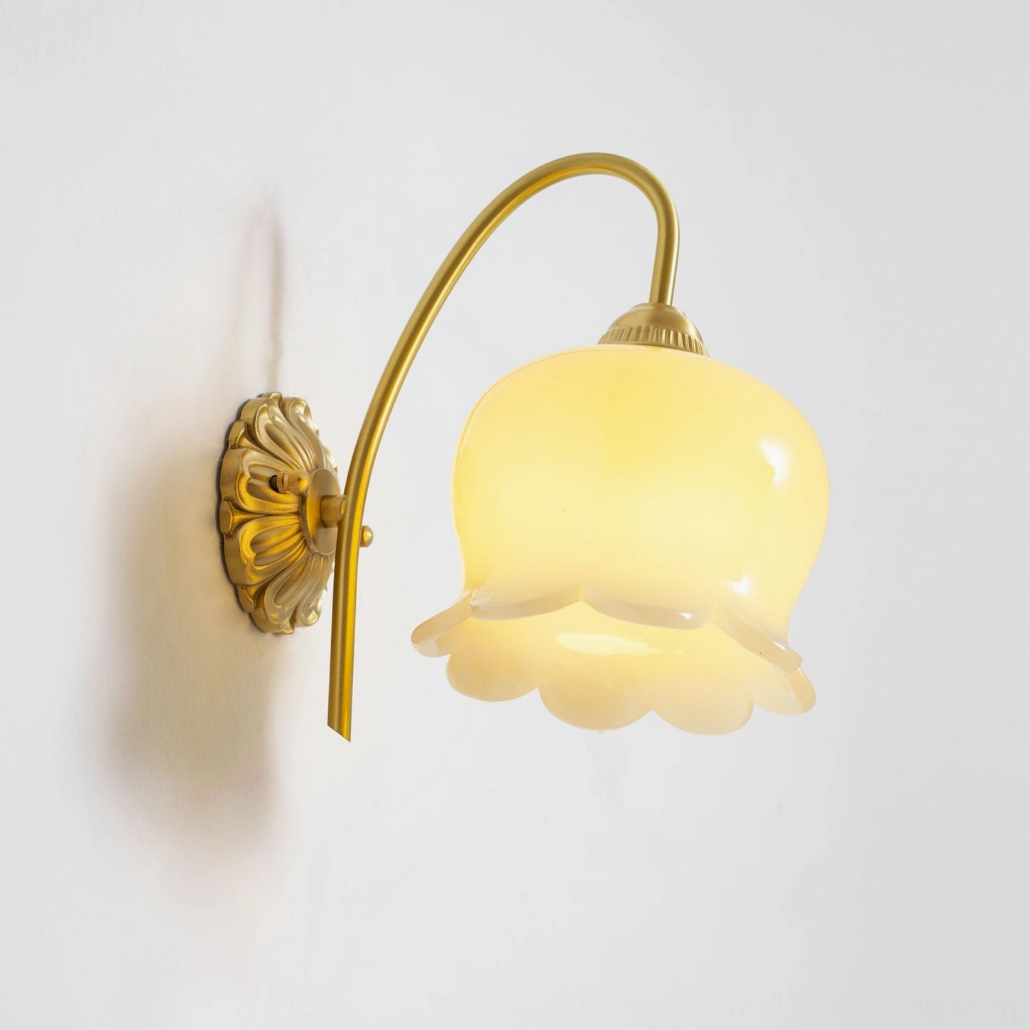 Lily of the valley wall lamp with warm color temperature creating cozy atmospheric lighting