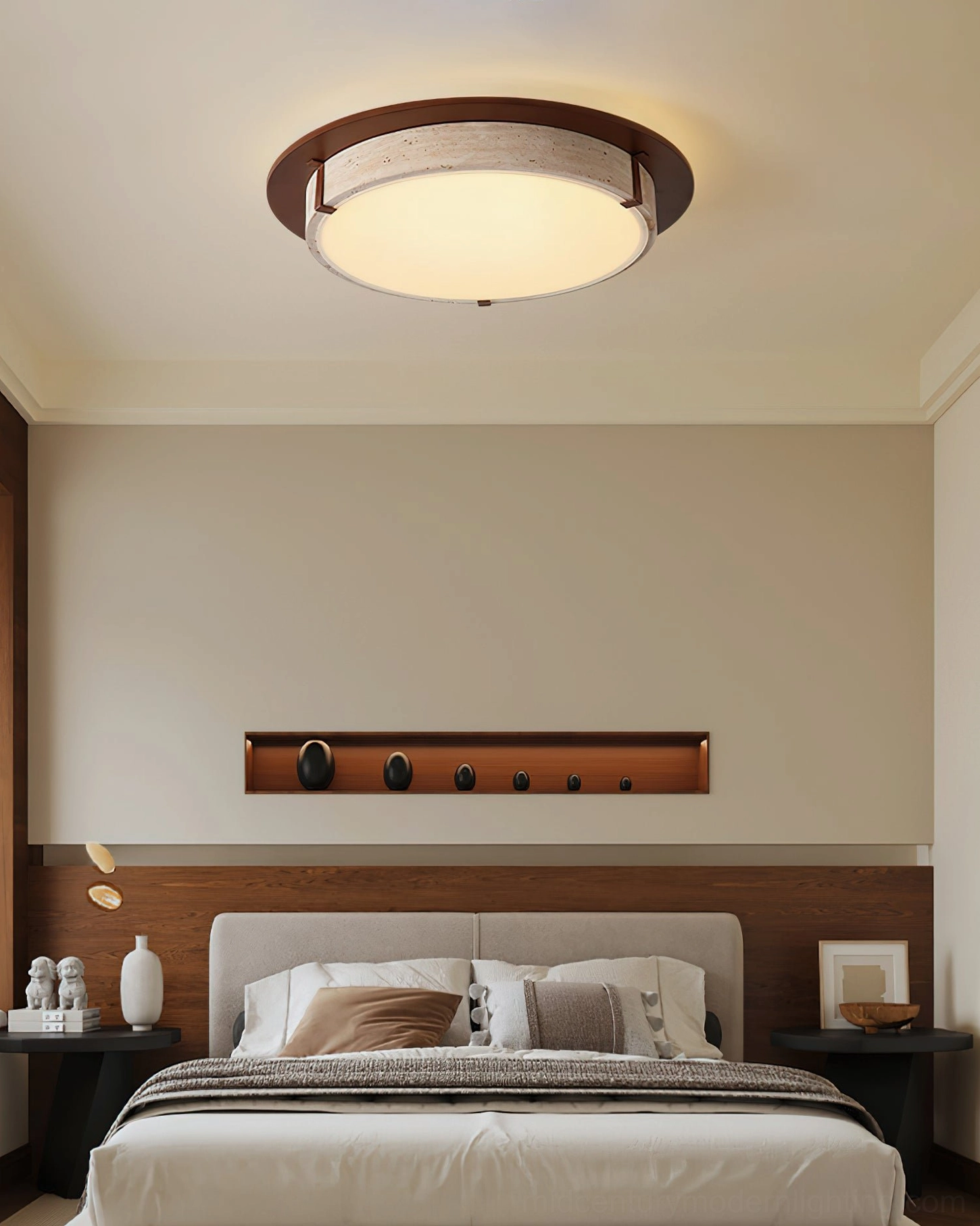Illuminated travertine ceiling light in warm mid-century modern bedroom with wall art and contemporary decor