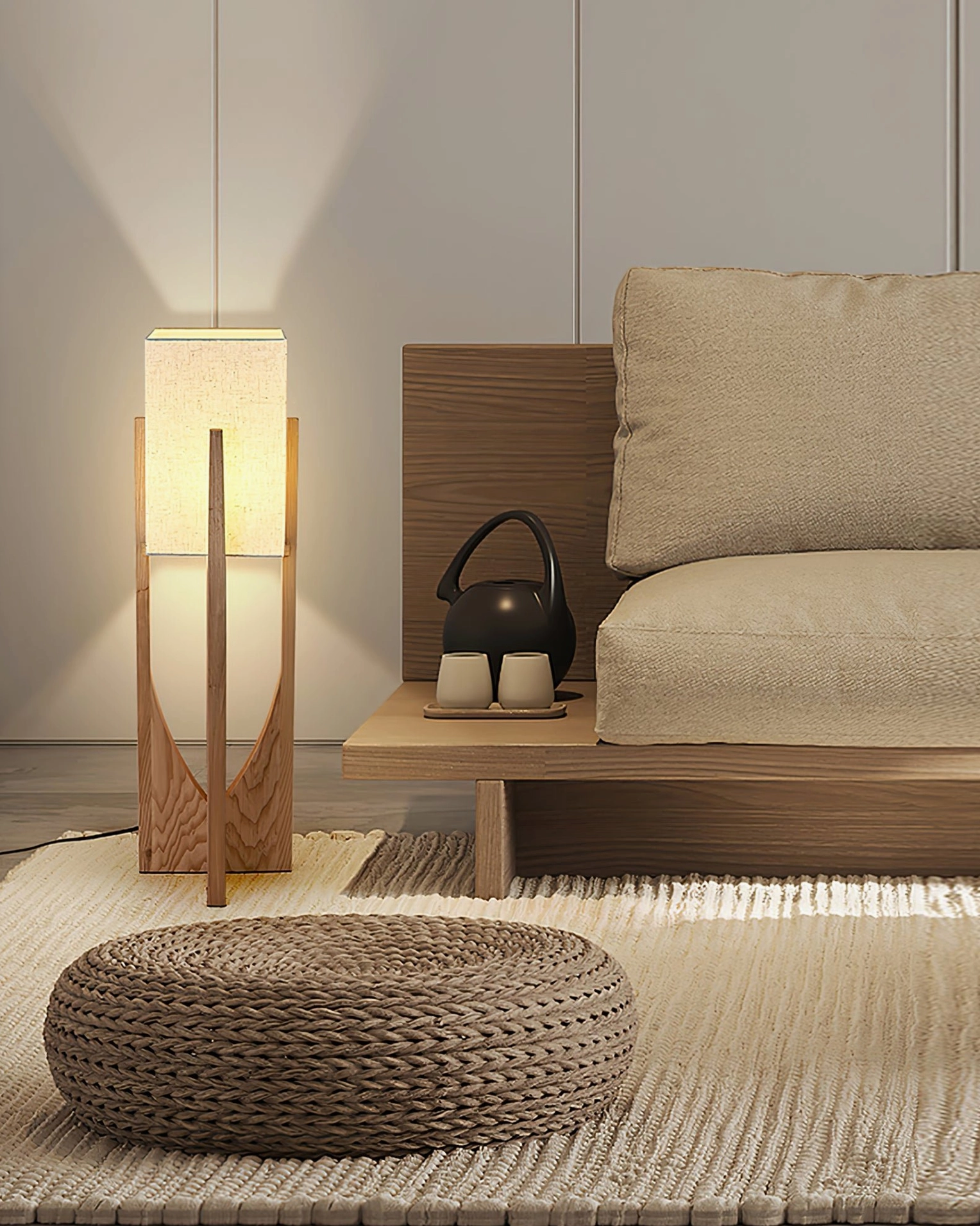 Fairbanks floor lamp coordinating with warm wood furniture and low wooden table in lounge setting