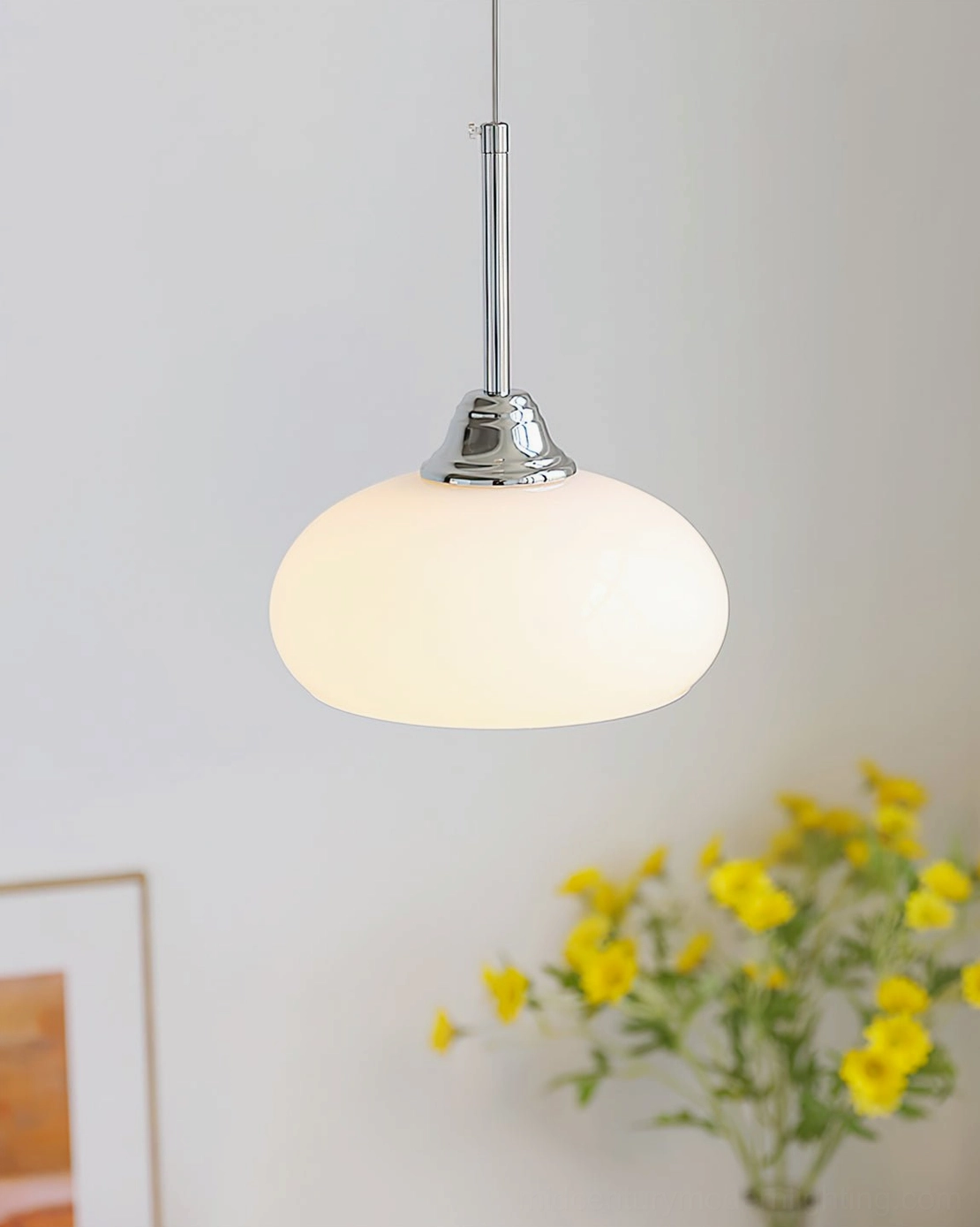 White Bell Pendant Light shining brightly in modern minimalist room with yellow flower decoration