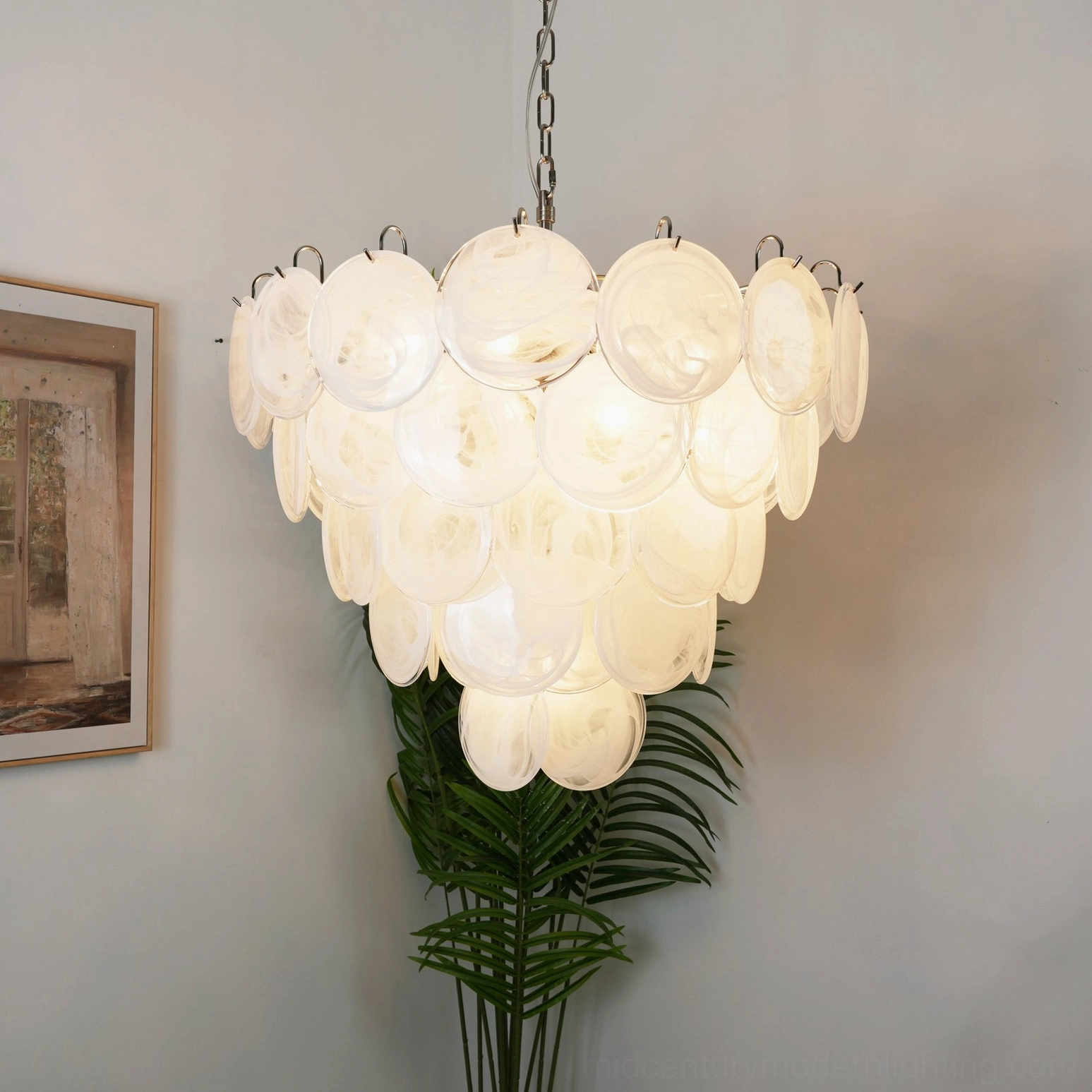 White translucent disc chandelier with layered glass discs and metal frame, contemporary interior ambient lighting display