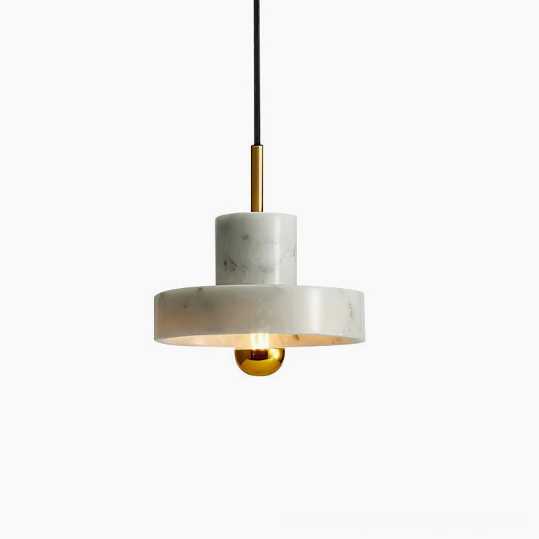 White marble pendant lamp hung above modern dining surface in scandinavian minimalist style home