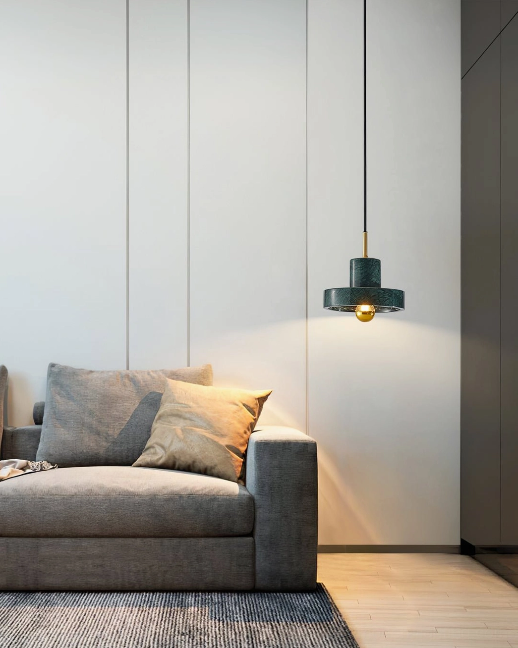 White marble pendant lamp close-up showing natural stone veining and brass hardware details