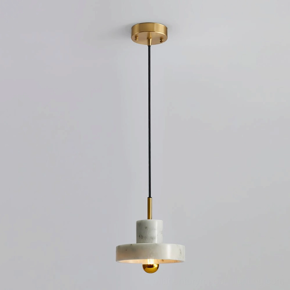 White marble pendant light with Edison bulb showing warm ambient glow and stone translucency