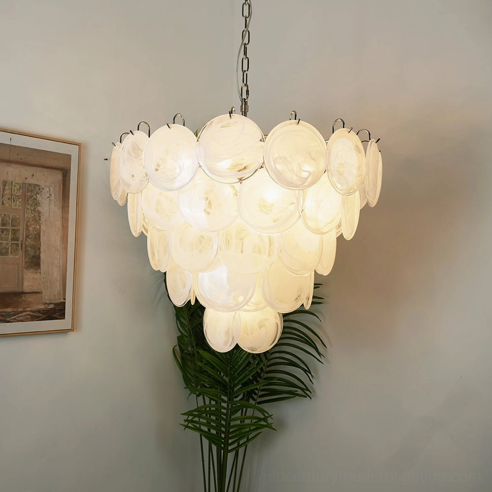 White Murano glass disc chandelier with cascading round discs creating sculptural presence, home interior three-quarter angle