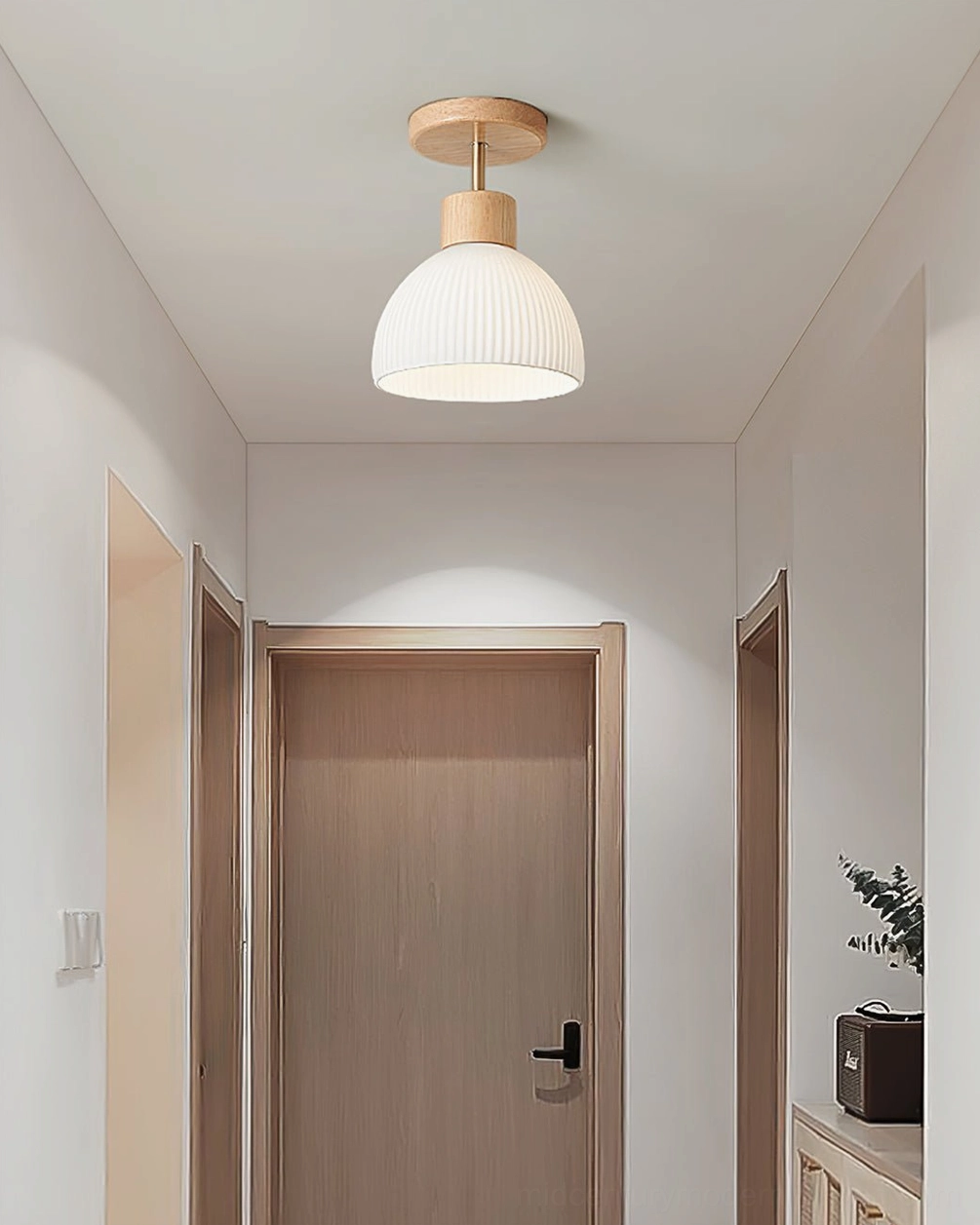 Close-up of ribbed white ceramic dome shade with vertical flute texture and light transmission