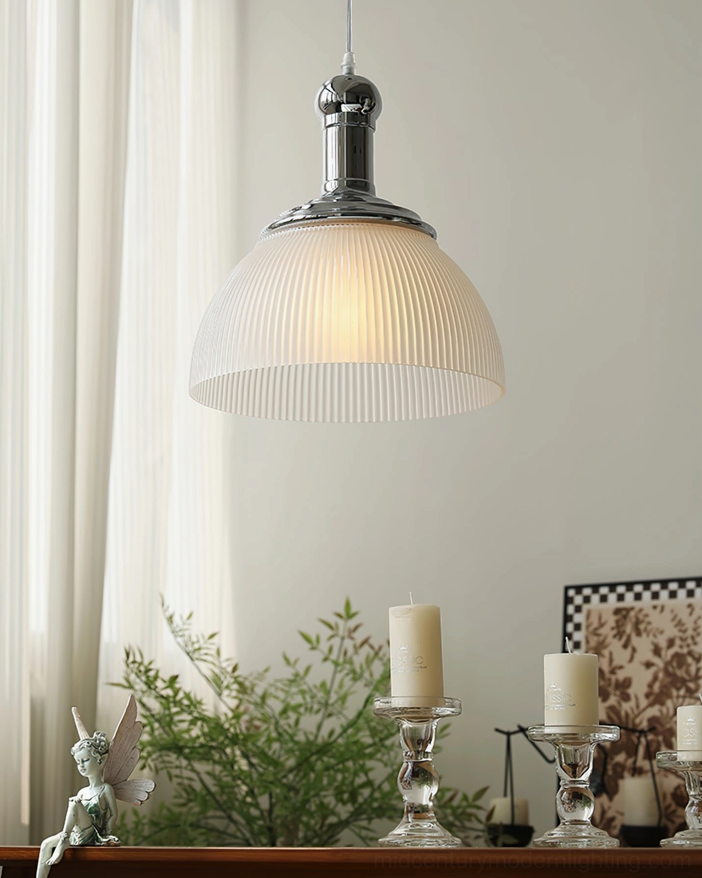 Clear white ribbed pendant lamp from low angle creating soft ambient illumination in dining space