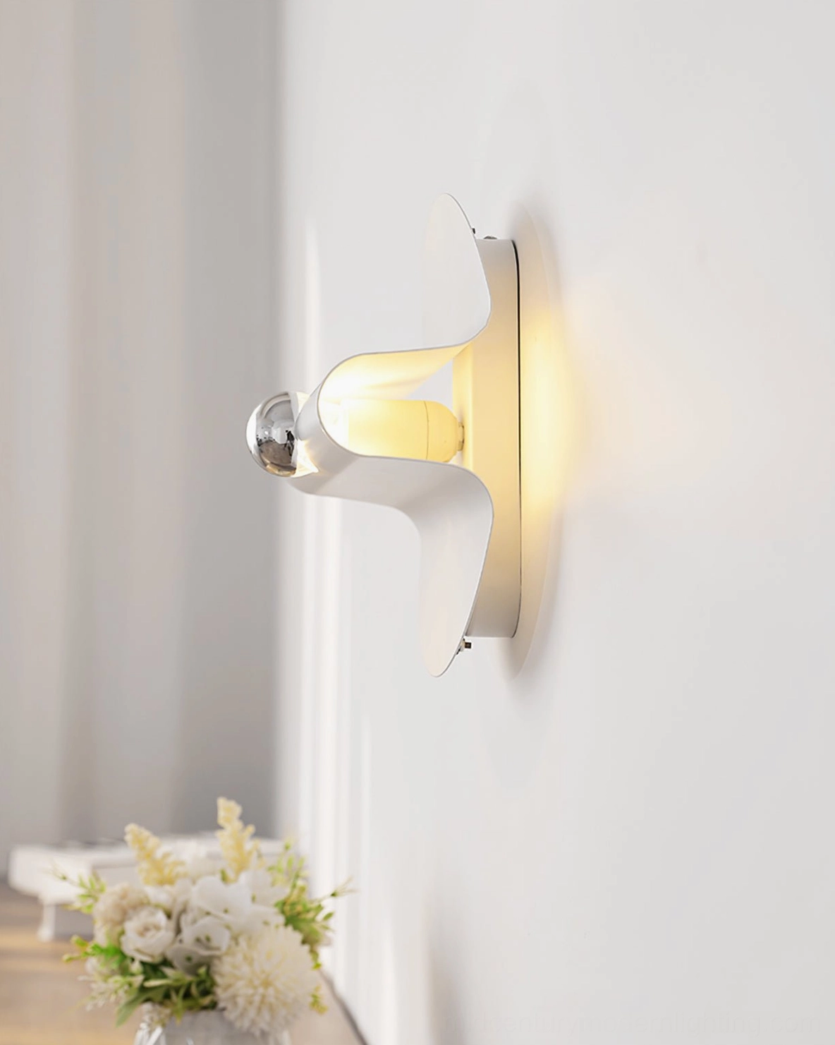 Minimalist modern wall lamp installation showing functional elegance and clean aesthetic
