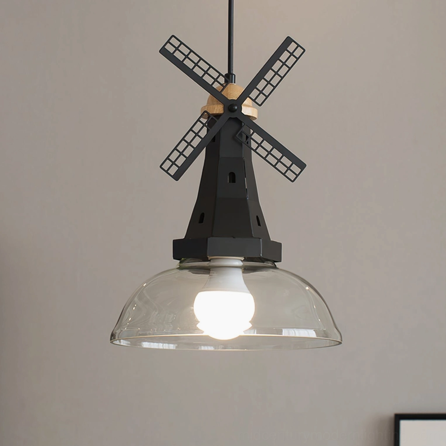 Windmill pendant light ambient room setting showcasing mid-century modern interior styling