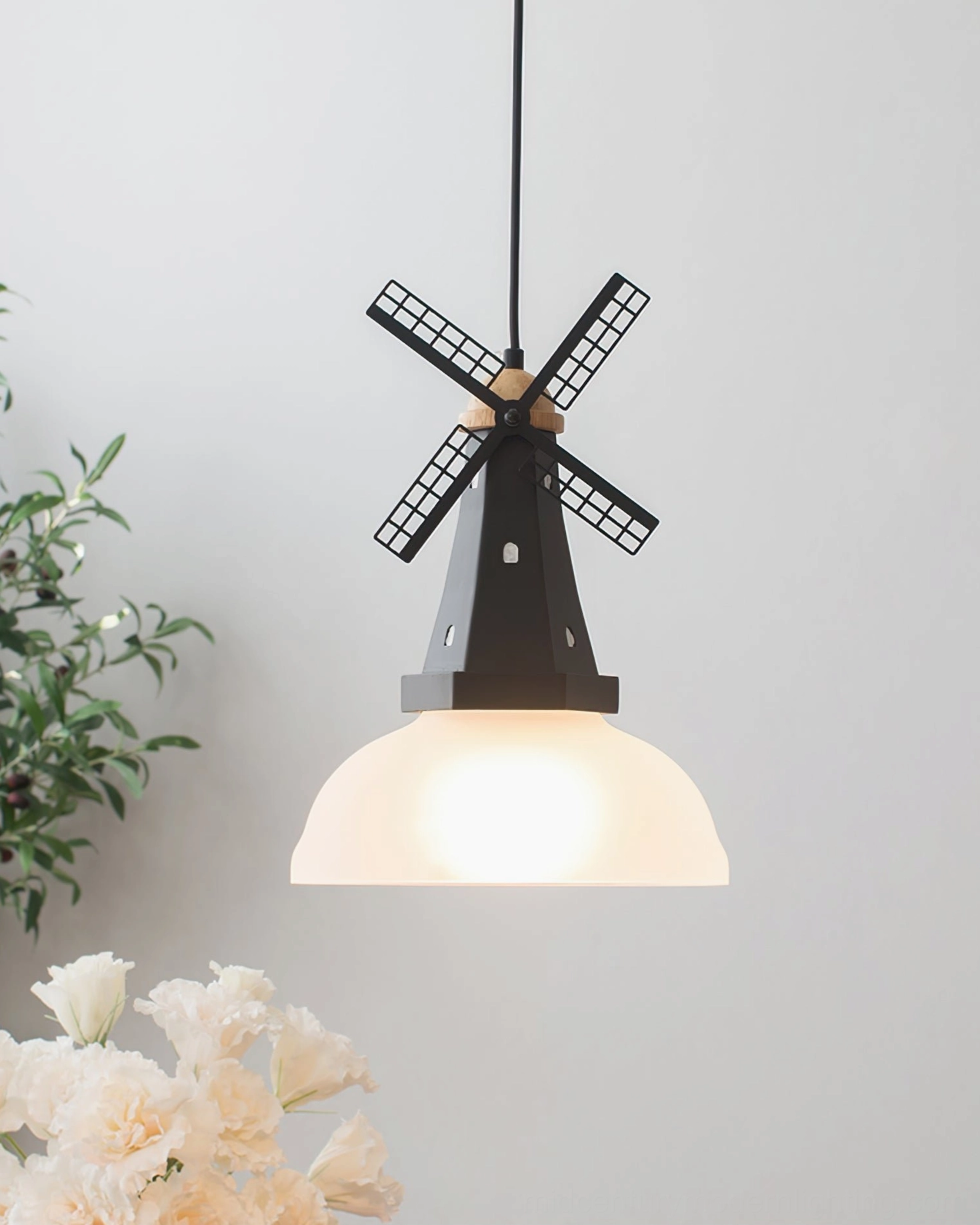 Windmill pendant in black finish with frosted shade mid-century modern interior design