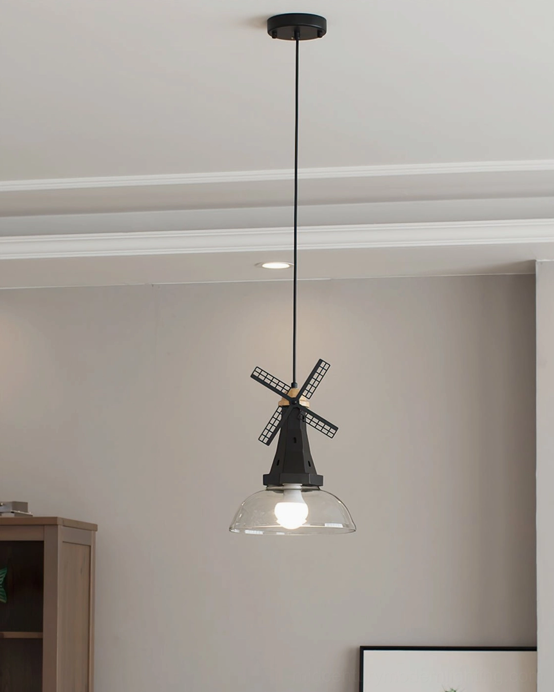 Windmill pendant light close-up showing glass shade quality and frame finishes available