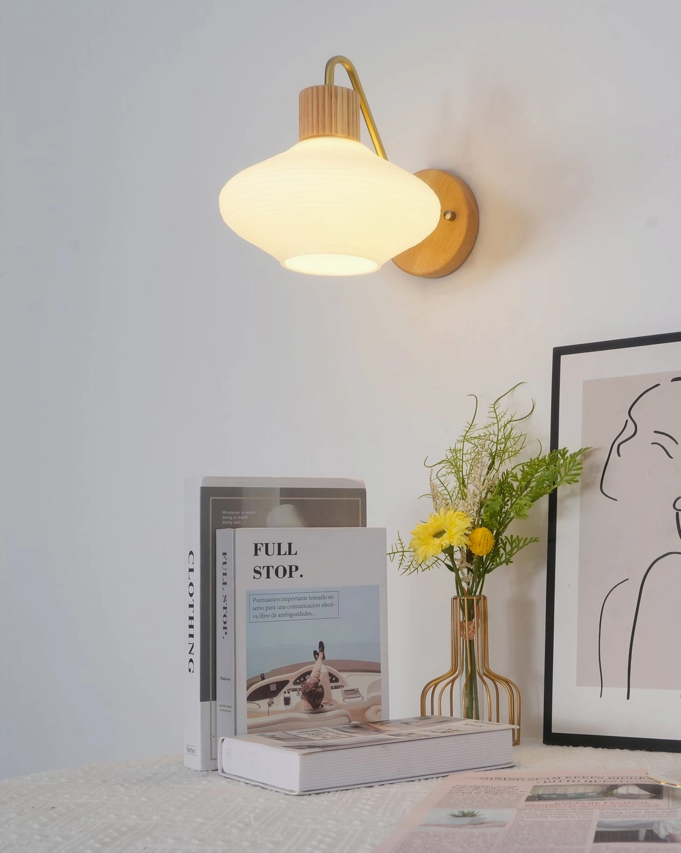 Wohlert wall-mounted bedside reading lamp with frosted glass shade