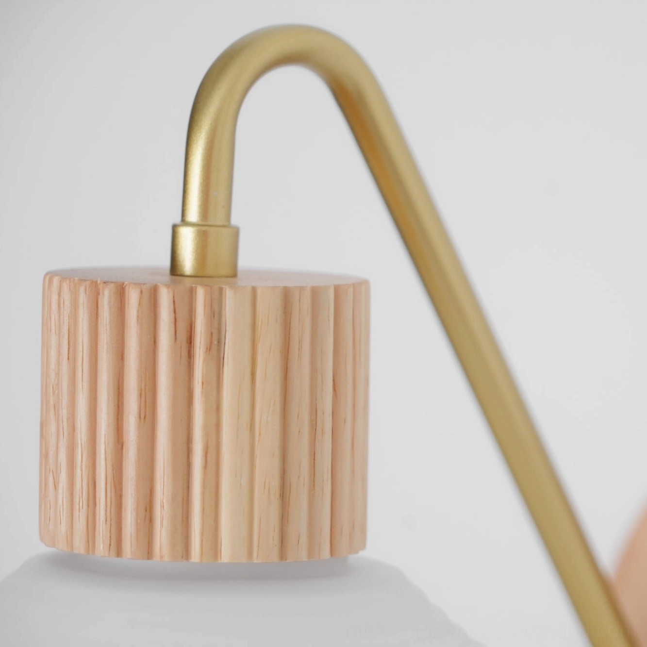 Wohlert Nordic wood wall sconce with ribbed frosted glass and brass arm detail