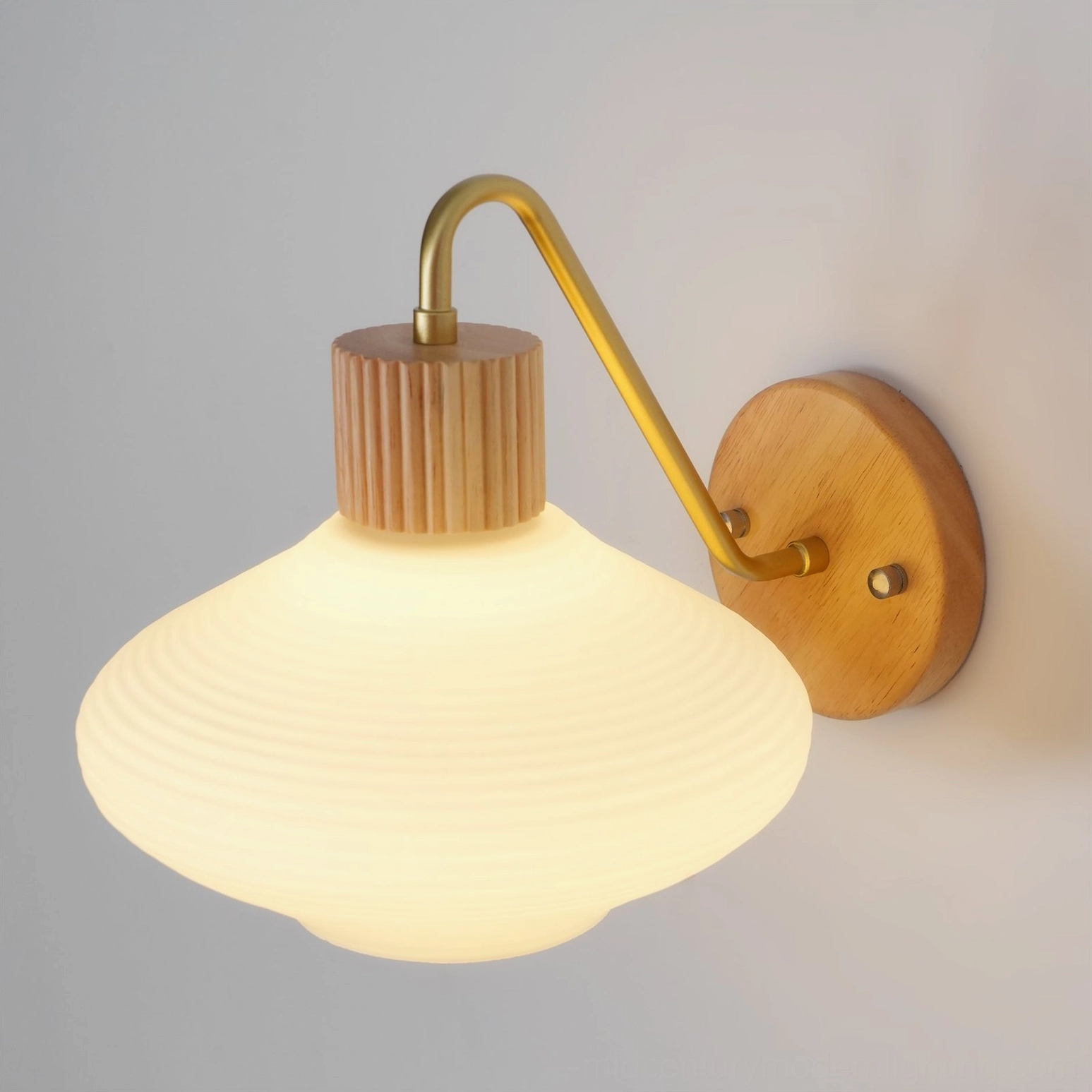 Wohlert ribbed frosted glass shade close-up with warm glowing light effect