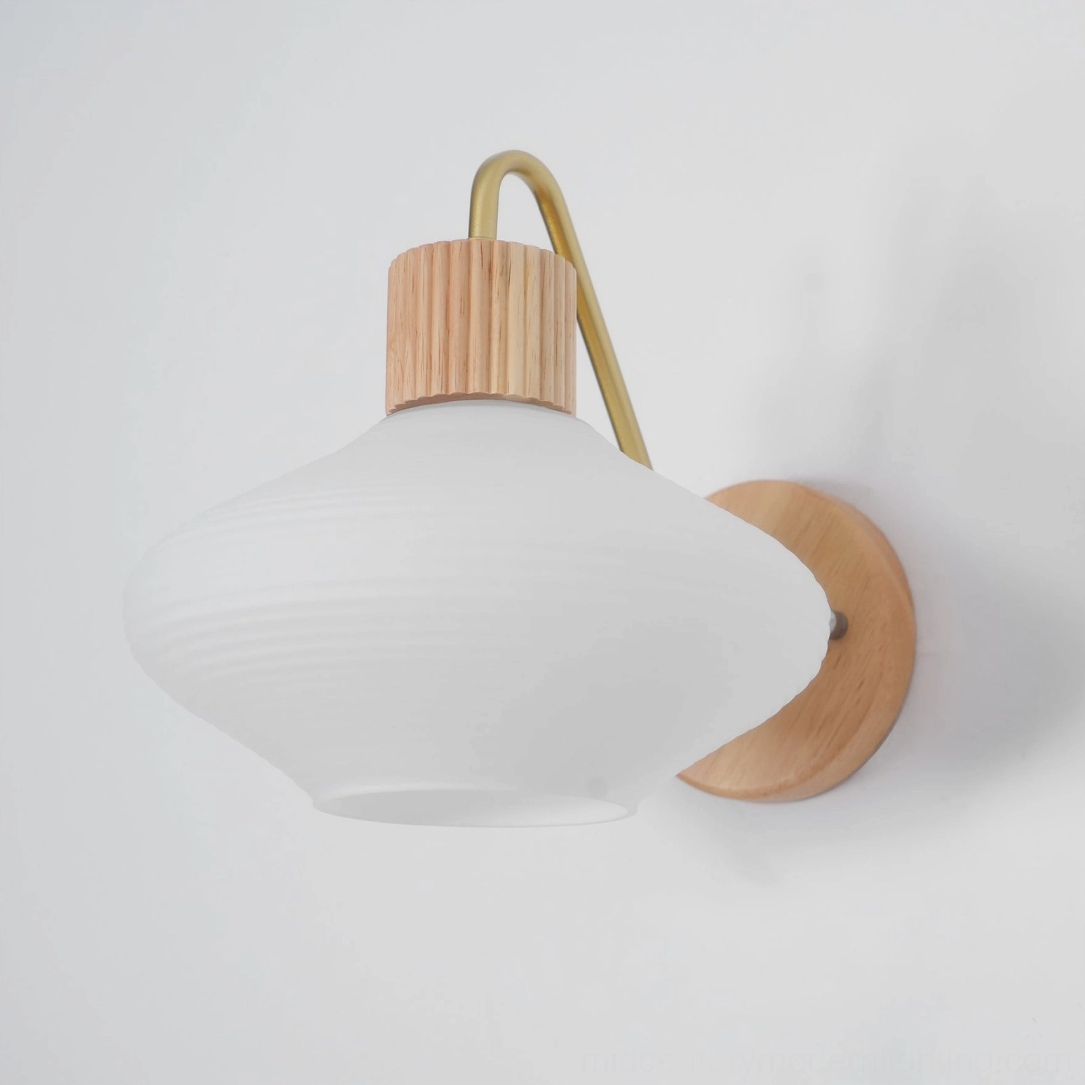 Wohlert wood and brass wall sconce rear three-quarter view with matte white shade
