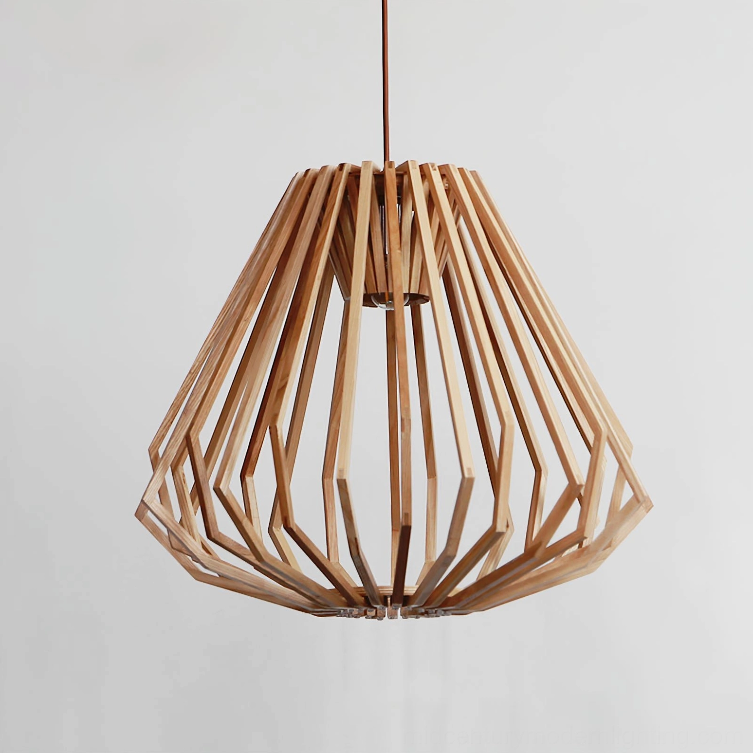 Close-up detail of tapered geometric wooden slat cage pendant showing precise craftsmanship and construction