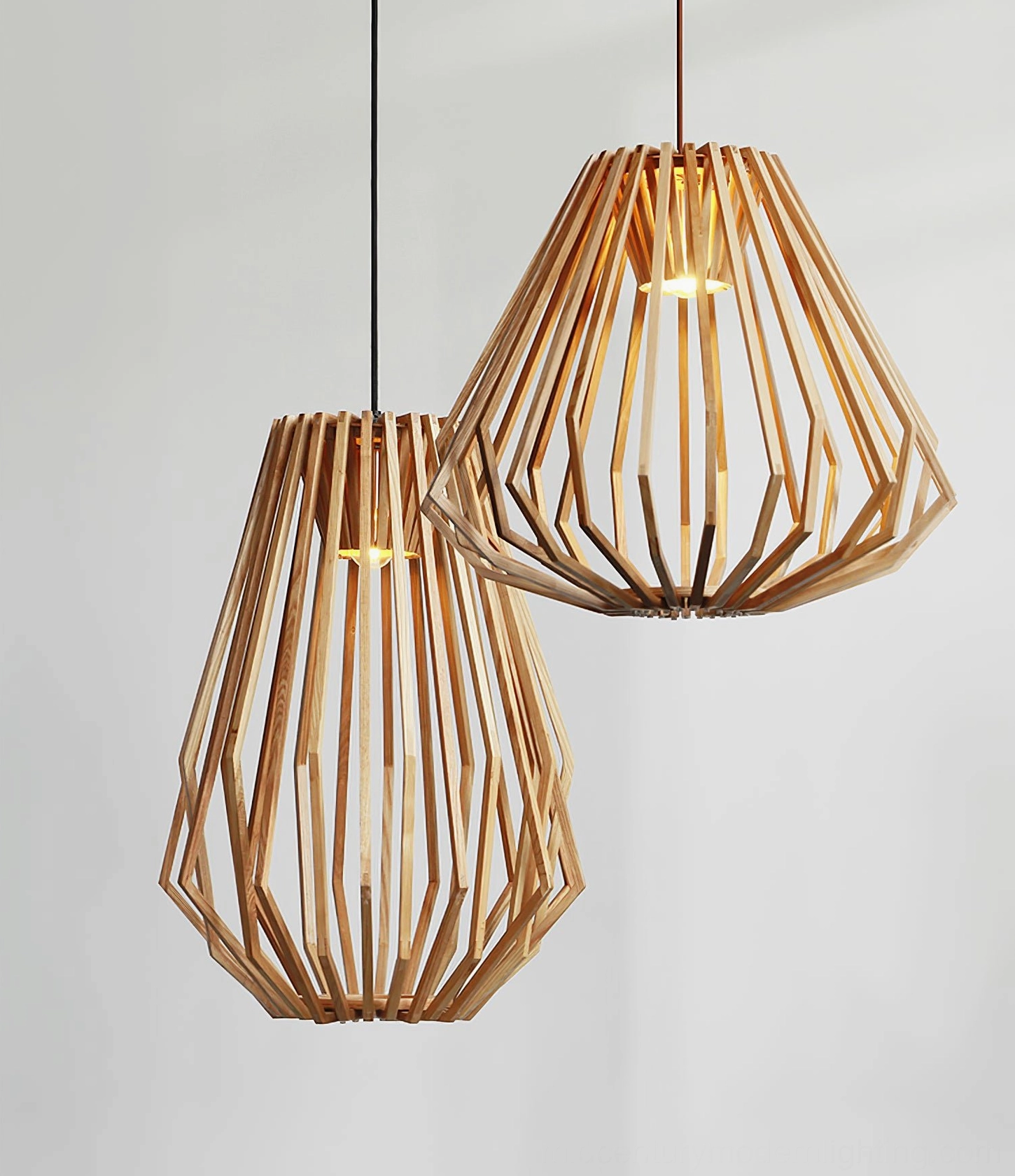Wood cage pendant lamp showing geometric slat design and natural wood tone with warm ambient light emission