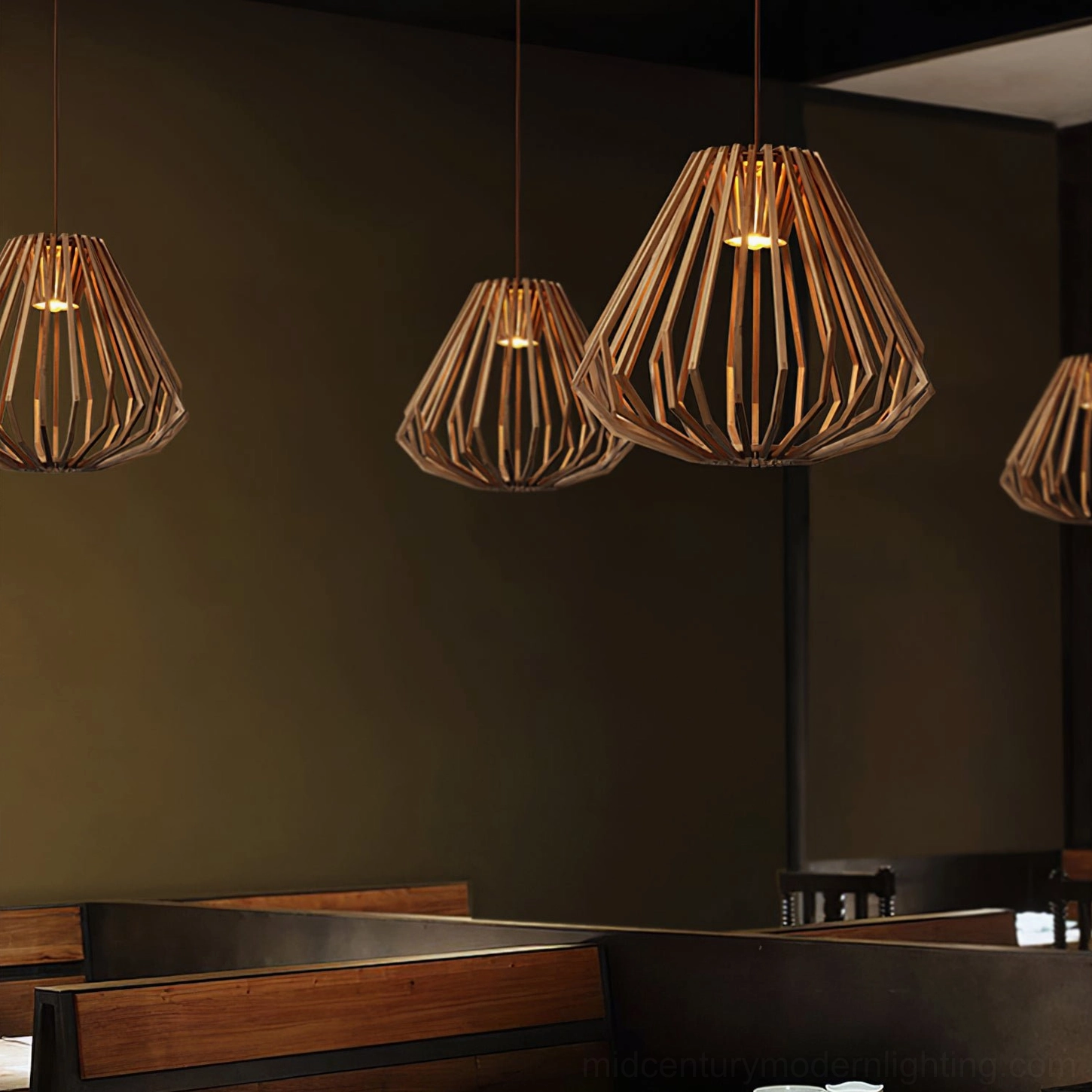 Multiple wood slat pendant lights in ambient restaurant setting demonstrating warm rustic lighting design application
