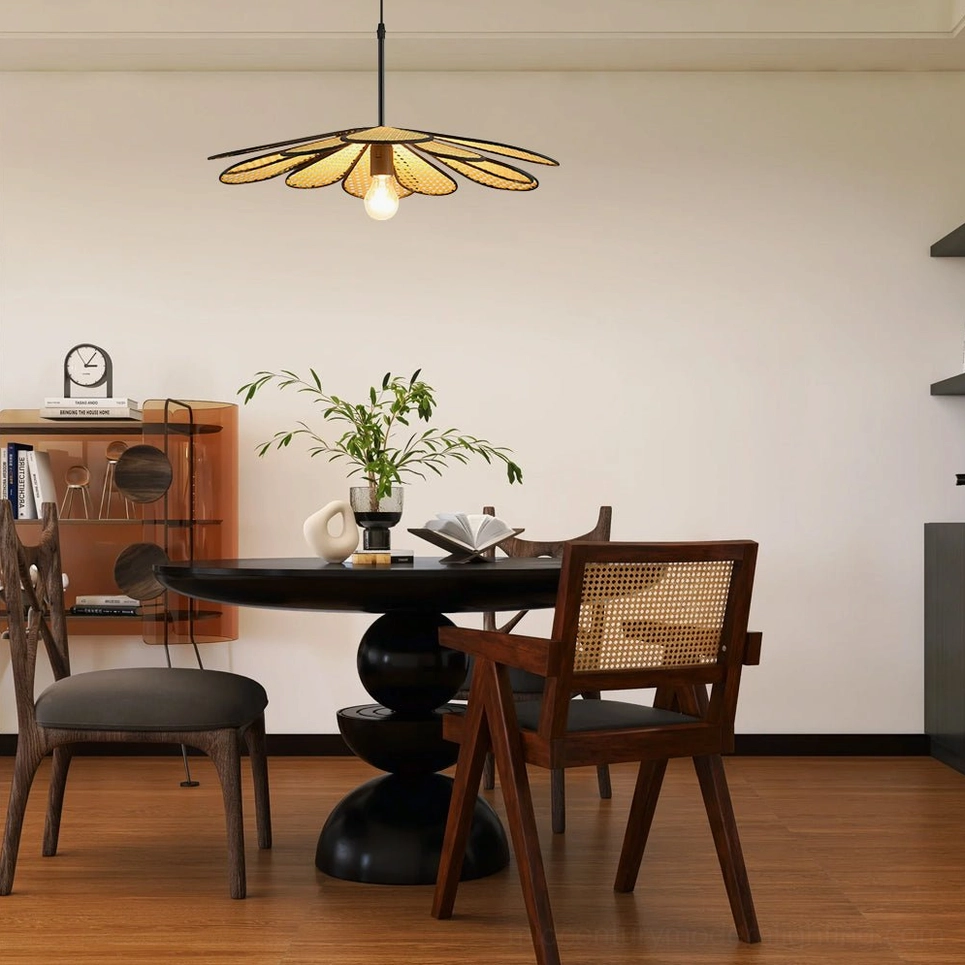 Woven flower pendant light suspended over dark wood mid-century dining corner with rustic home decor aesthetic