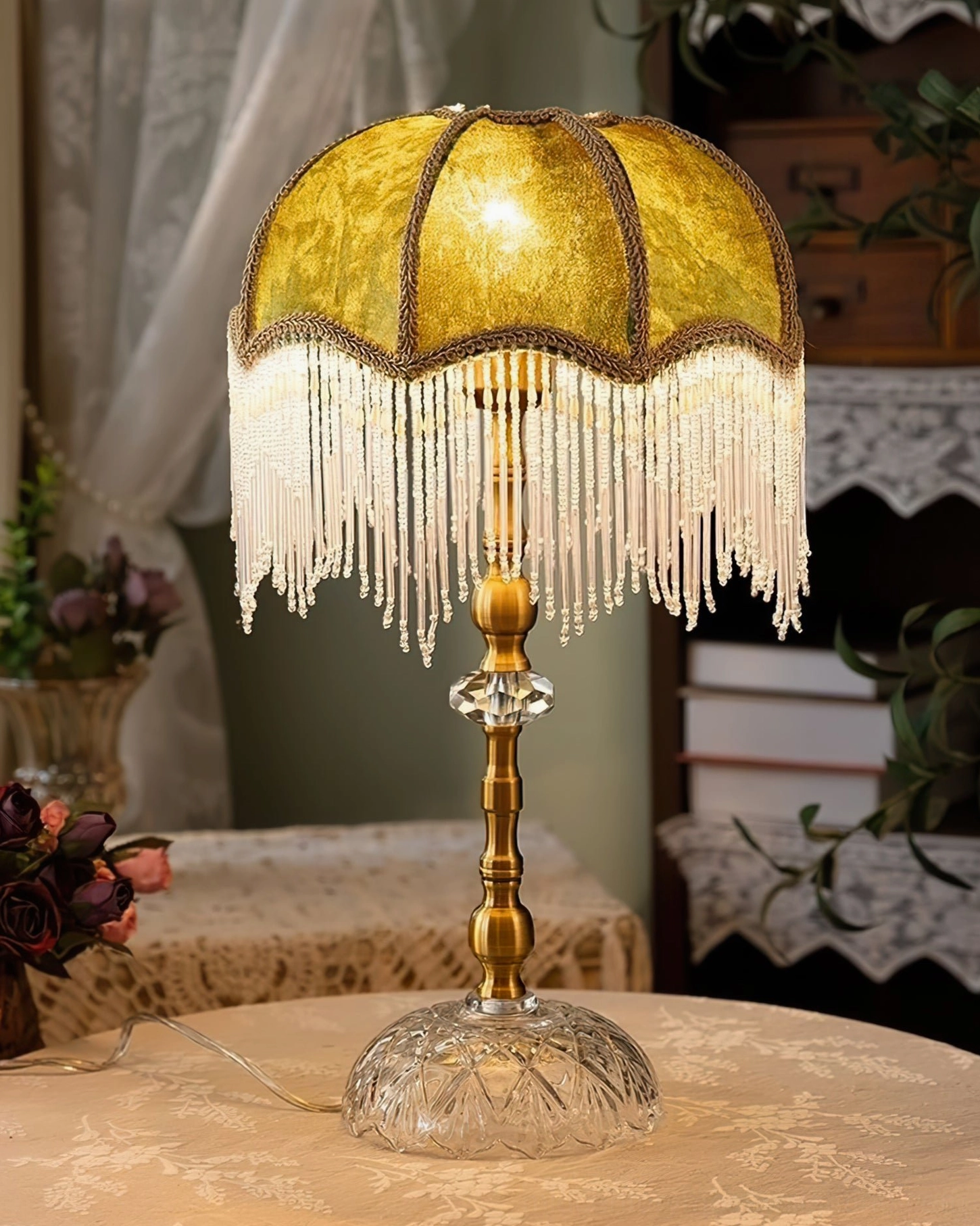 Yellow shade fringed table lamp with beaded tassel trim and clear crystal base