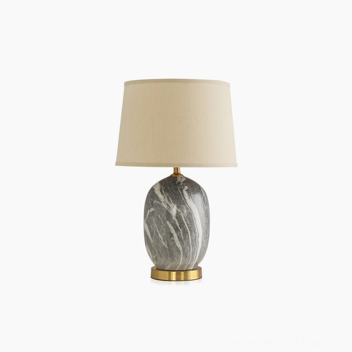 Black Yopal table lamp with textured marble ceramic body and warm brass base accent