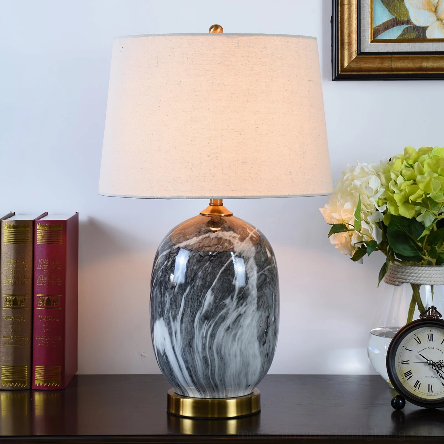 Grey marble ceramic table lamp in luxury living room setting with decor accents