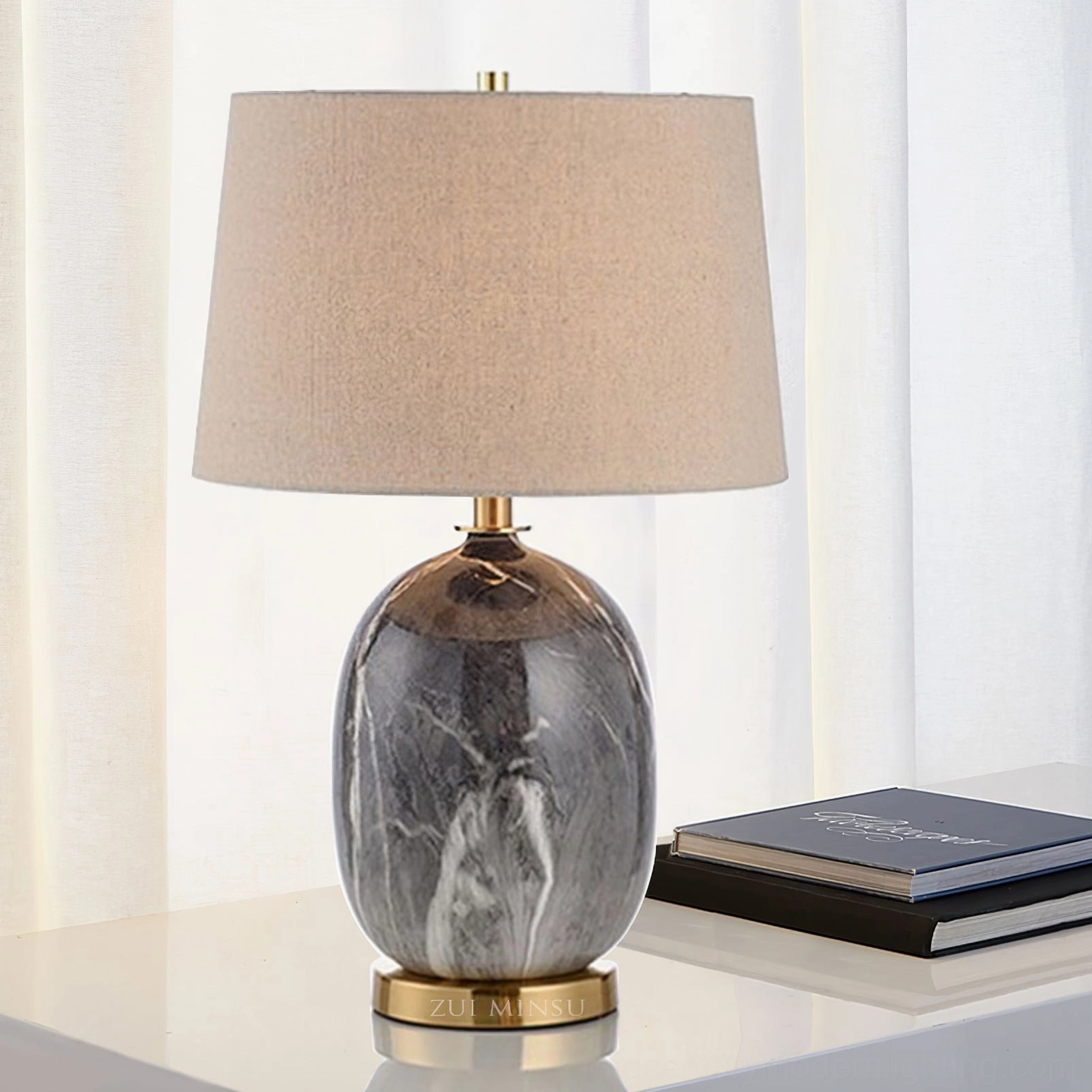Yopal marble table lamp three-quarter view showing ceramic texture and brass base detail