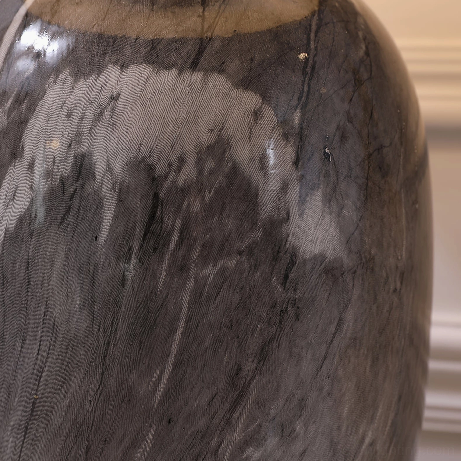 Yopal ceramic marble table lamp with LED bulb illuminated showing ambient light distribution