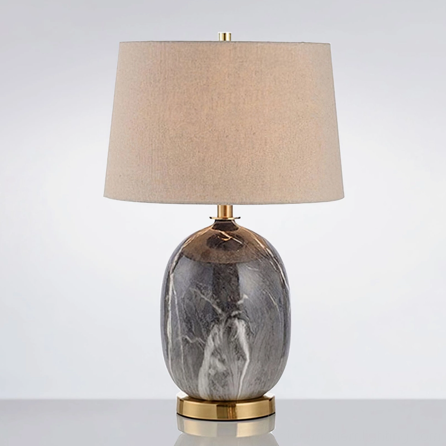 Yopal table lamp in modern interior with natural wood furniture and warm brass accents