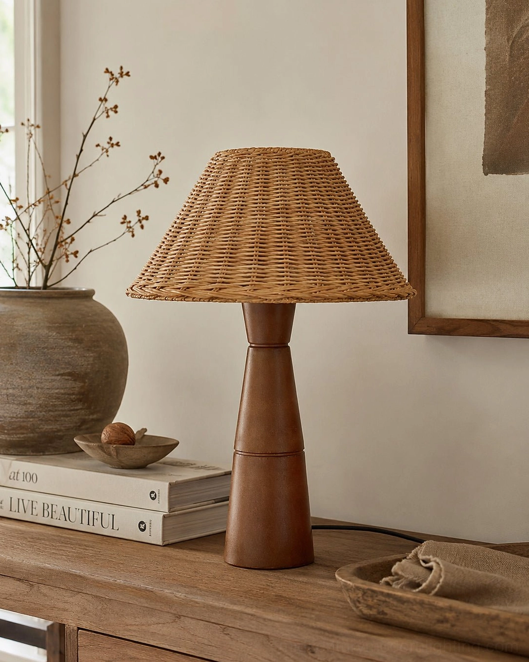 Zaya rattan lamp on wooden console table with dried florals and minimal accessories, farmhouse boho design