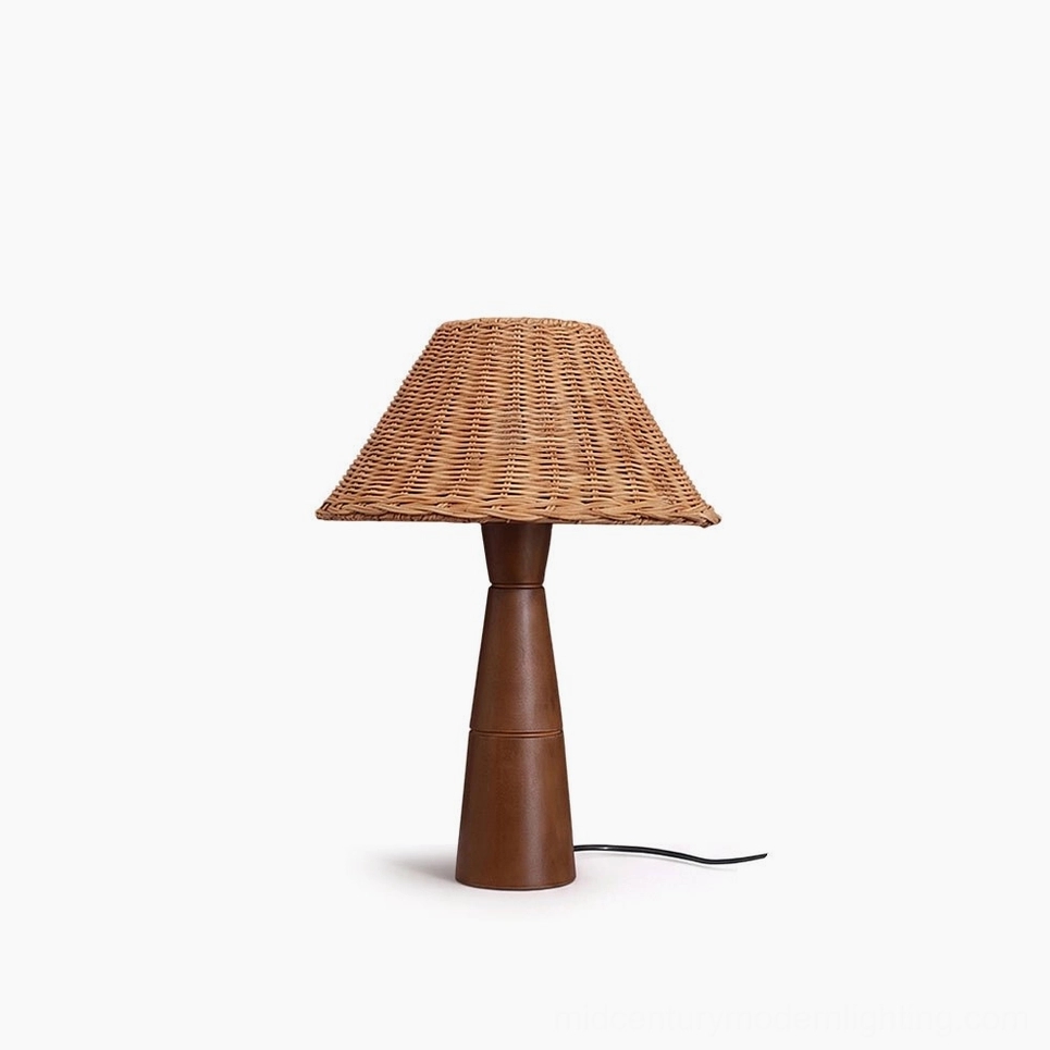 Zaya rattan table lamp with walnut wood base on white background, front view showcasing natural weave pattern