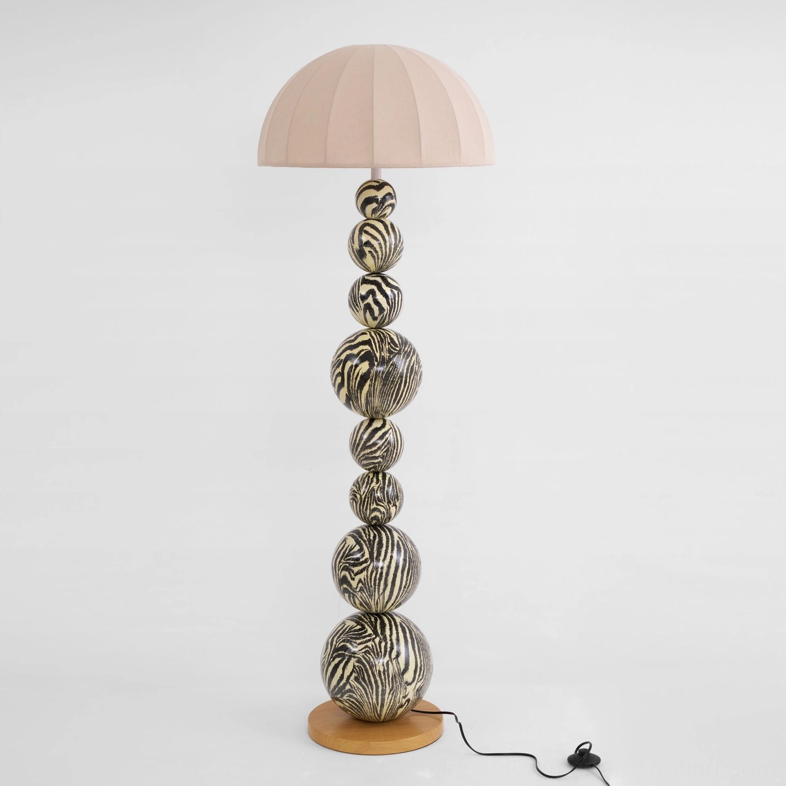 Full length zebra striped floor lamp from base to shade, sculptural design showcase