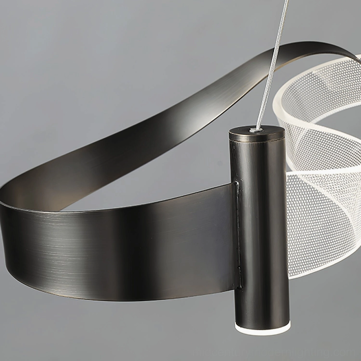 Close-up overhead view of Zephyr LED chandelier component featuring matte black metal frame and white mesh light diffuser