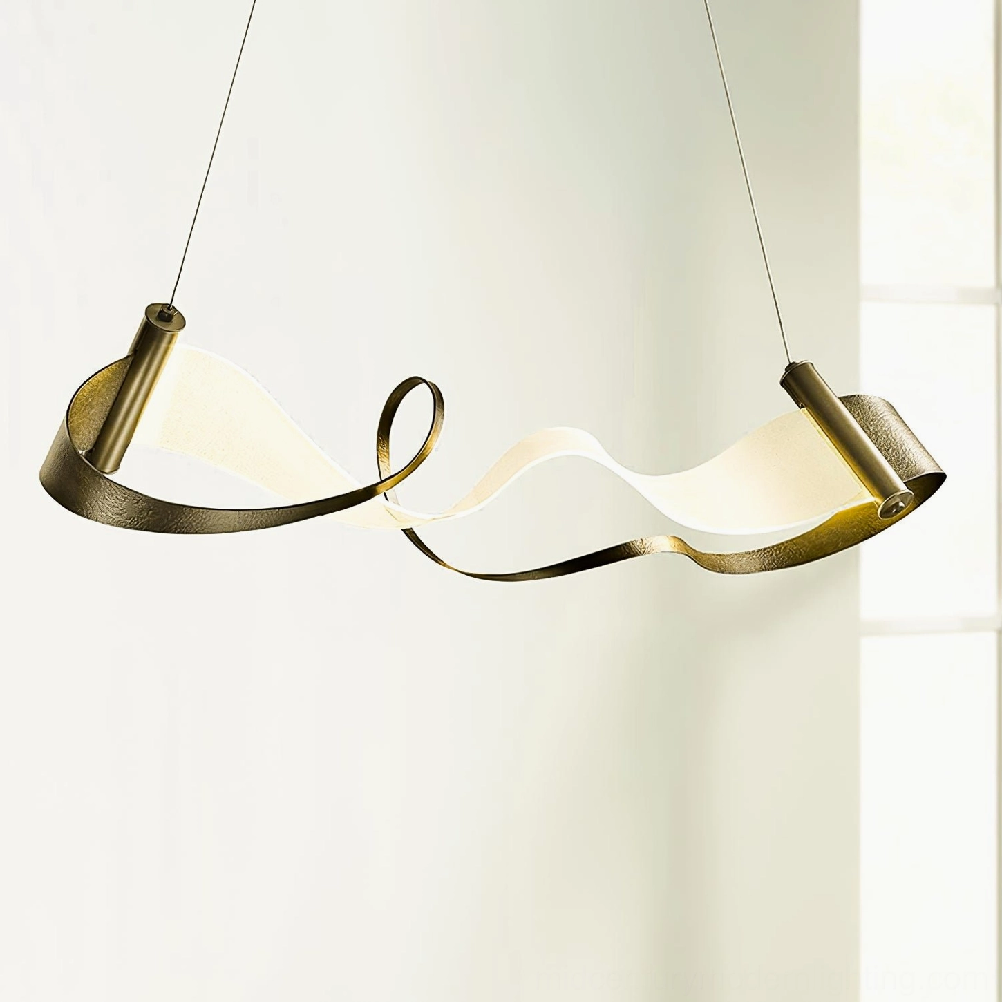 Side view of Zephyr LED chandelier in contemporary home displaying black and gold metal frame organic curved silhouette