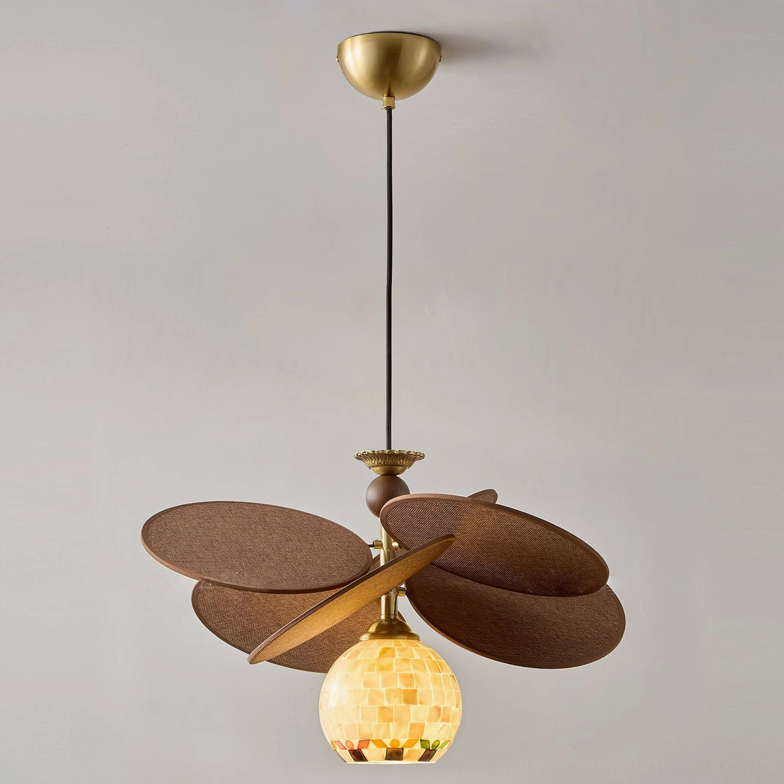 Coastal boho tropical modern Zinnia Flora chandelier suspended in contemporary interior space