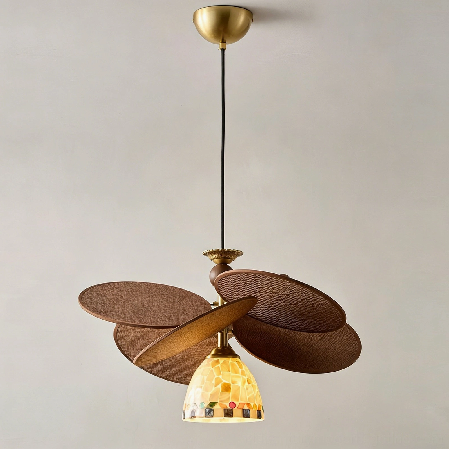 Zinnia Flora chandelier installation detail showing brushed brass hardware and sphere mounting