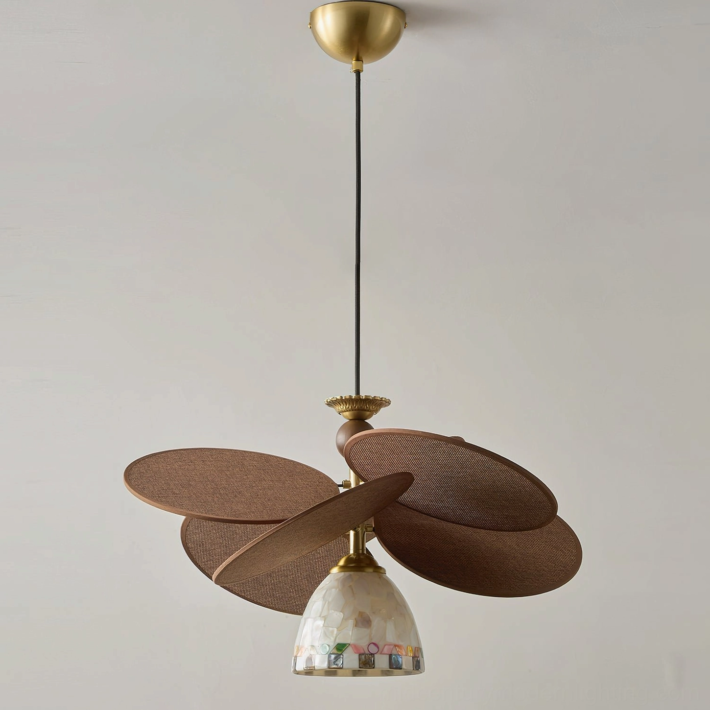Glare-free ambient light diffusion through Zinnia Flora mosaic shell globes in interior setting