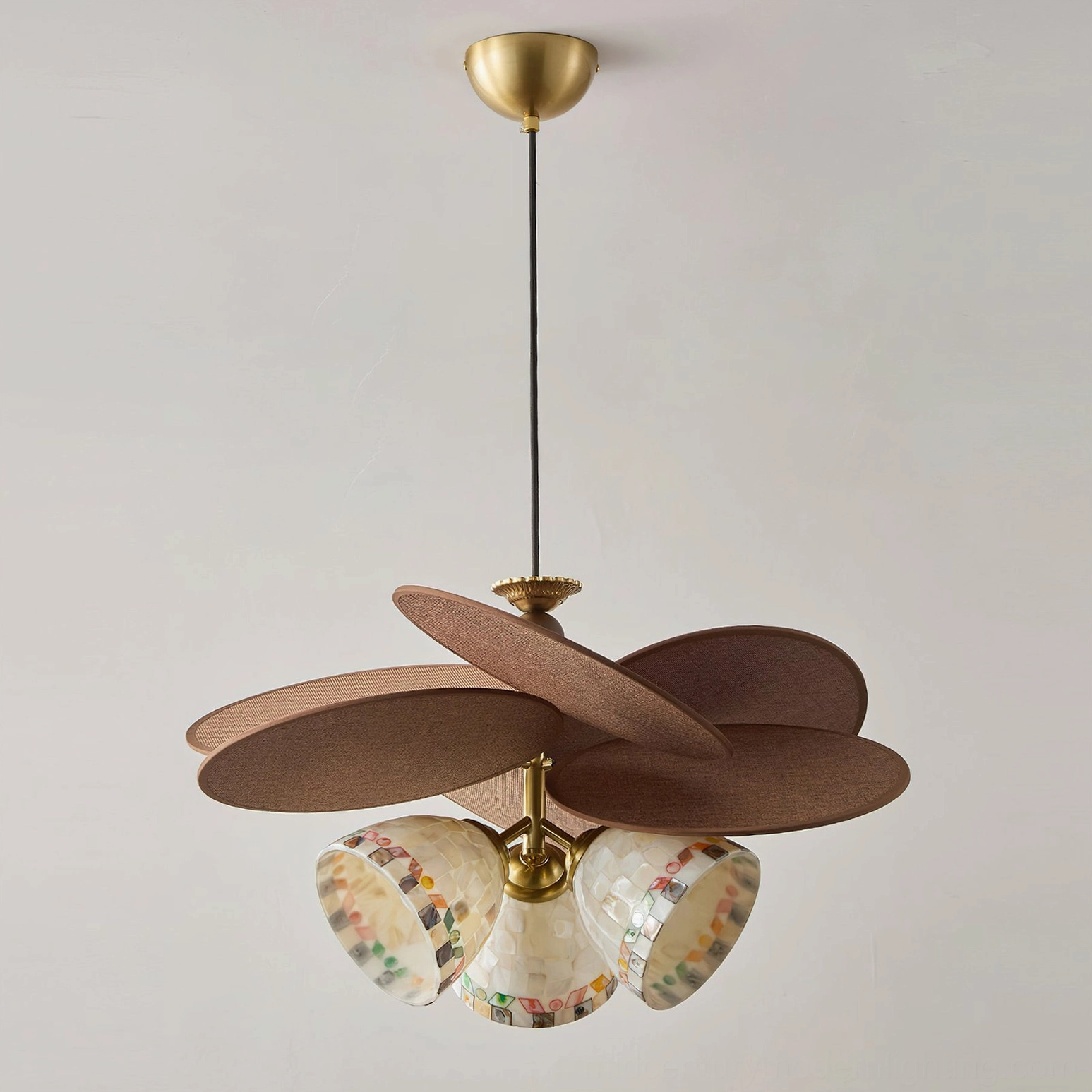 Woven natural raffia petal shade of Zinnia Flora chandelier organic botanical design