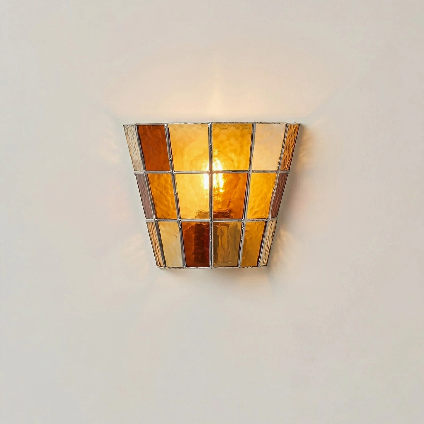 Zola amber glass wall sconce warm honey-toned light source product detail