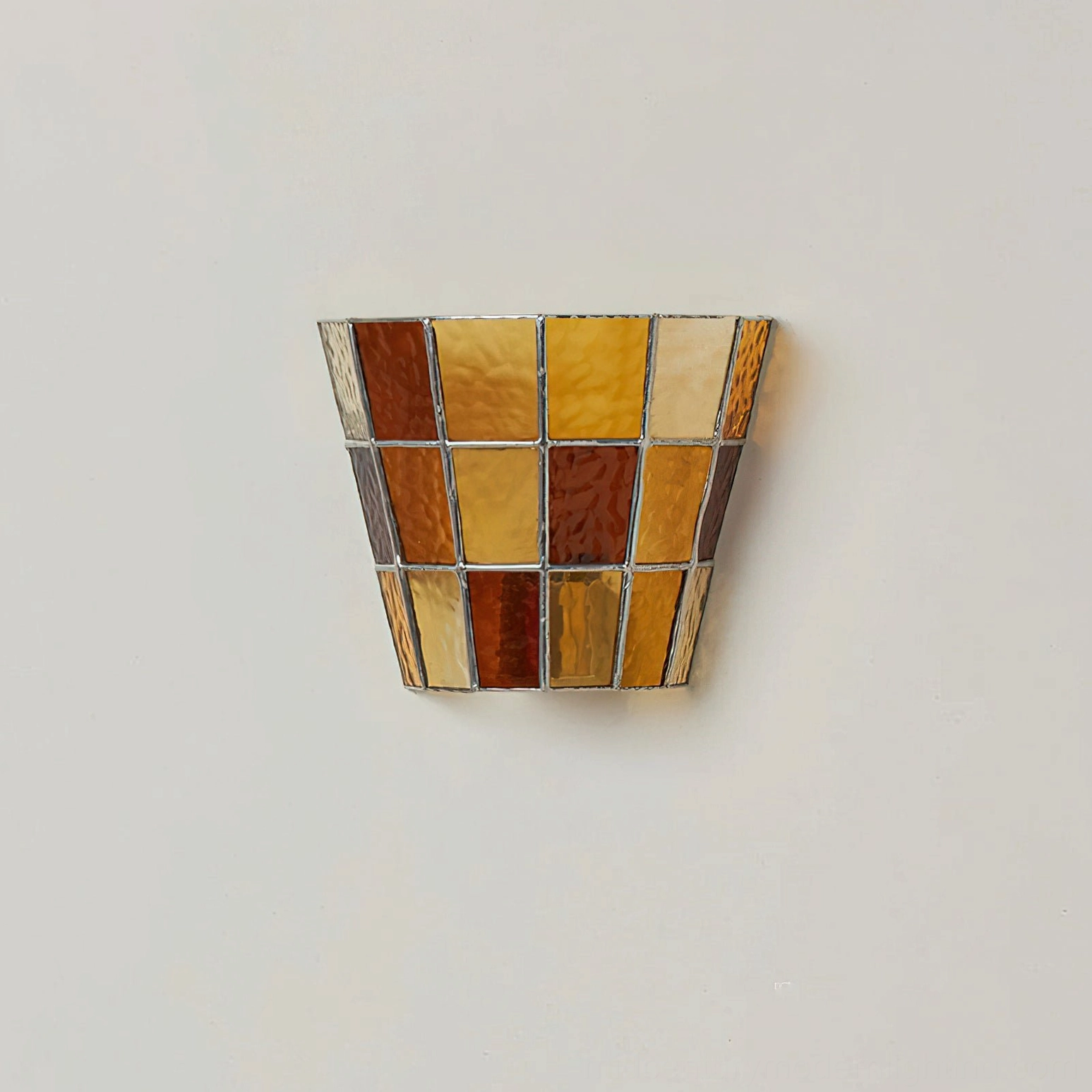 Zola blue stained glass sconce product shot illustrating geometric craftsman grid pattern