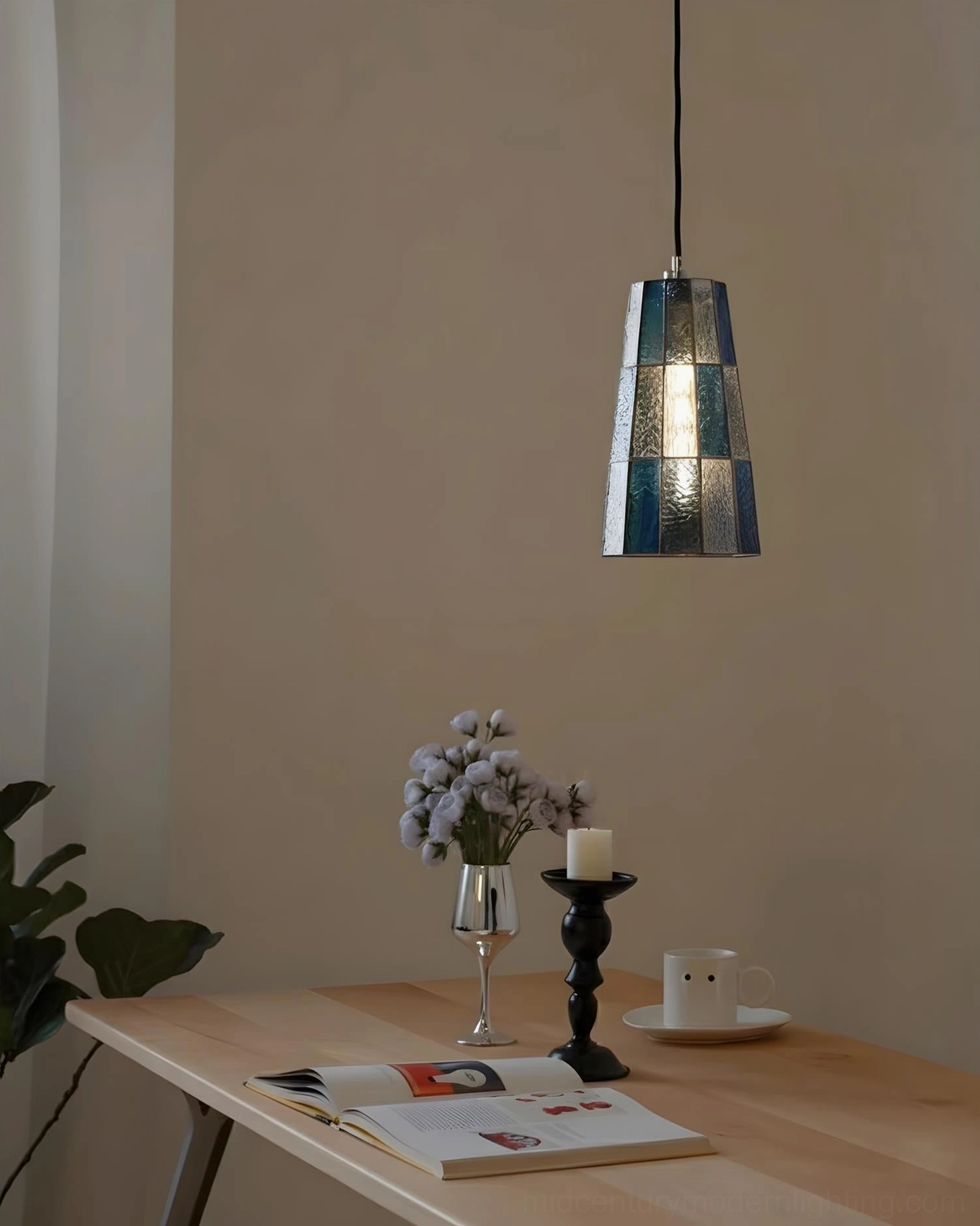 Zola blue gradient stained glass pendant lamp in minimalist workspace, eye-level wall-mounted view