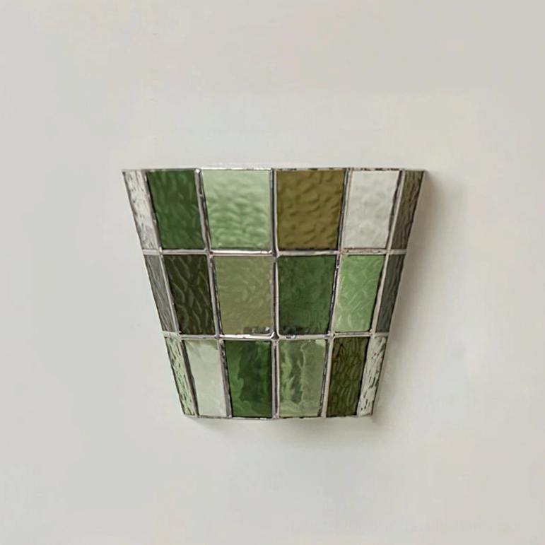 Zola green stained glass wall sconce jewel-tone colorway artistic close-up photography